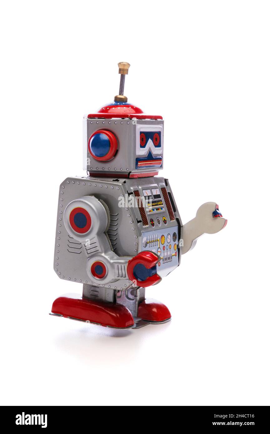Alte billige Spielzeug Roboter isoliert auf weißem Hintergrund Stockfoto