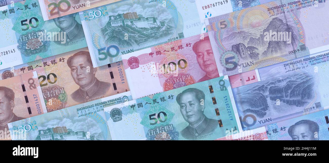 Yuan Renminbi Rechnung Banknoten Hintergrund. Vorsitzender Mao Porträt auf 100, 50, 20, 10 chinesische Papierwährung. Konzept der chinesischen Wirtschaft Stockfoto