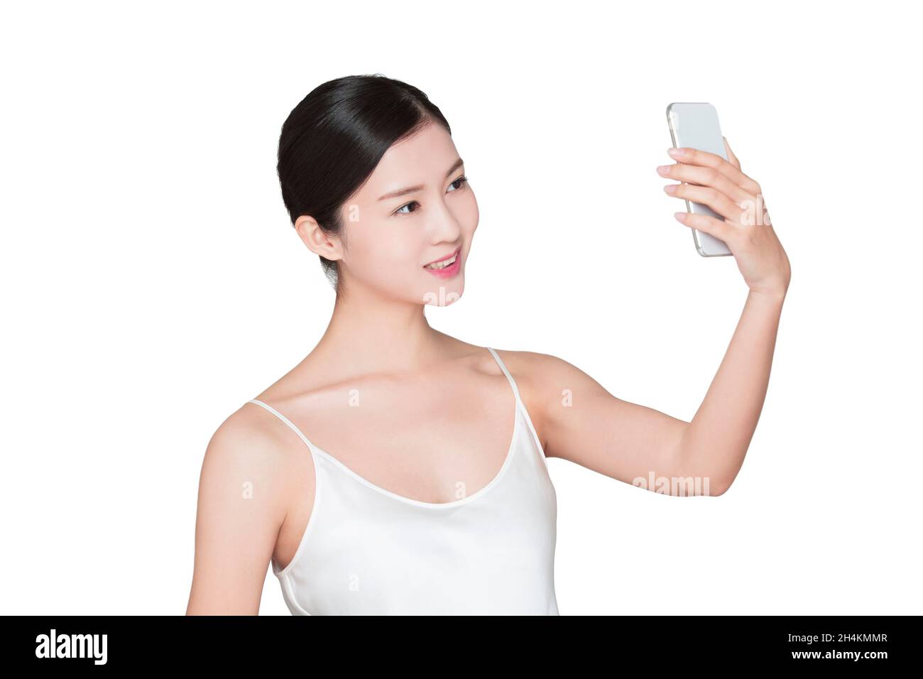 Junge Schönheit nimmt Selfies mit ihrem Handy Stockfoto