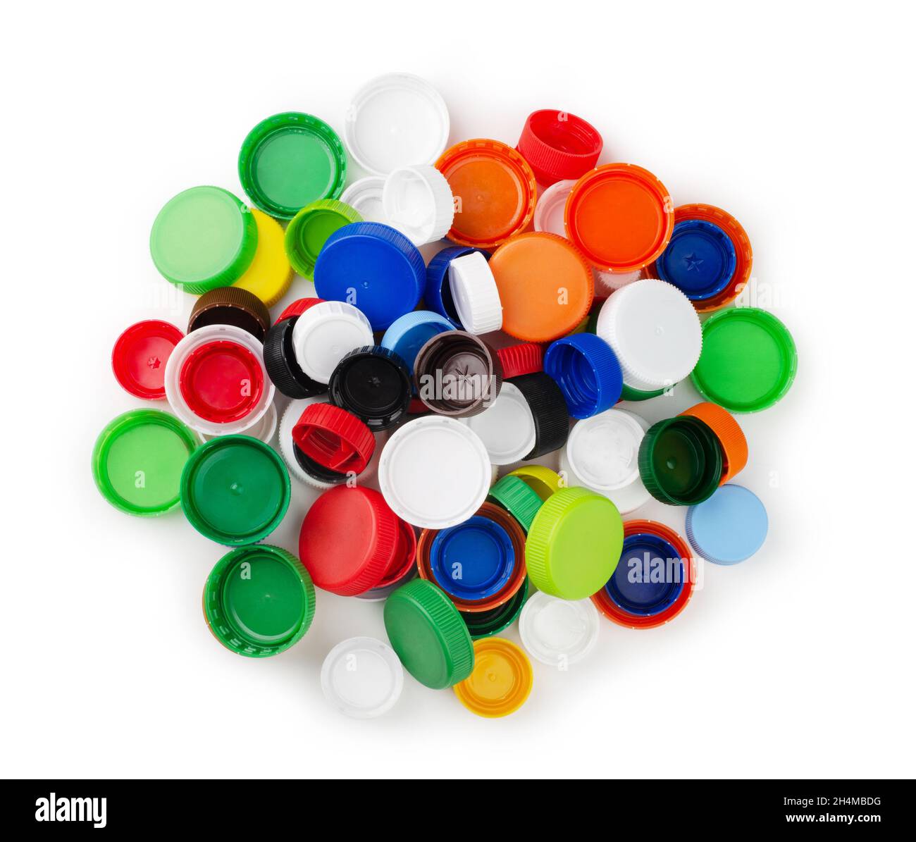 Kunststoffflaschen-Kappen isoliert auf weißem Hintergrund. Draufsicht Stockfoto