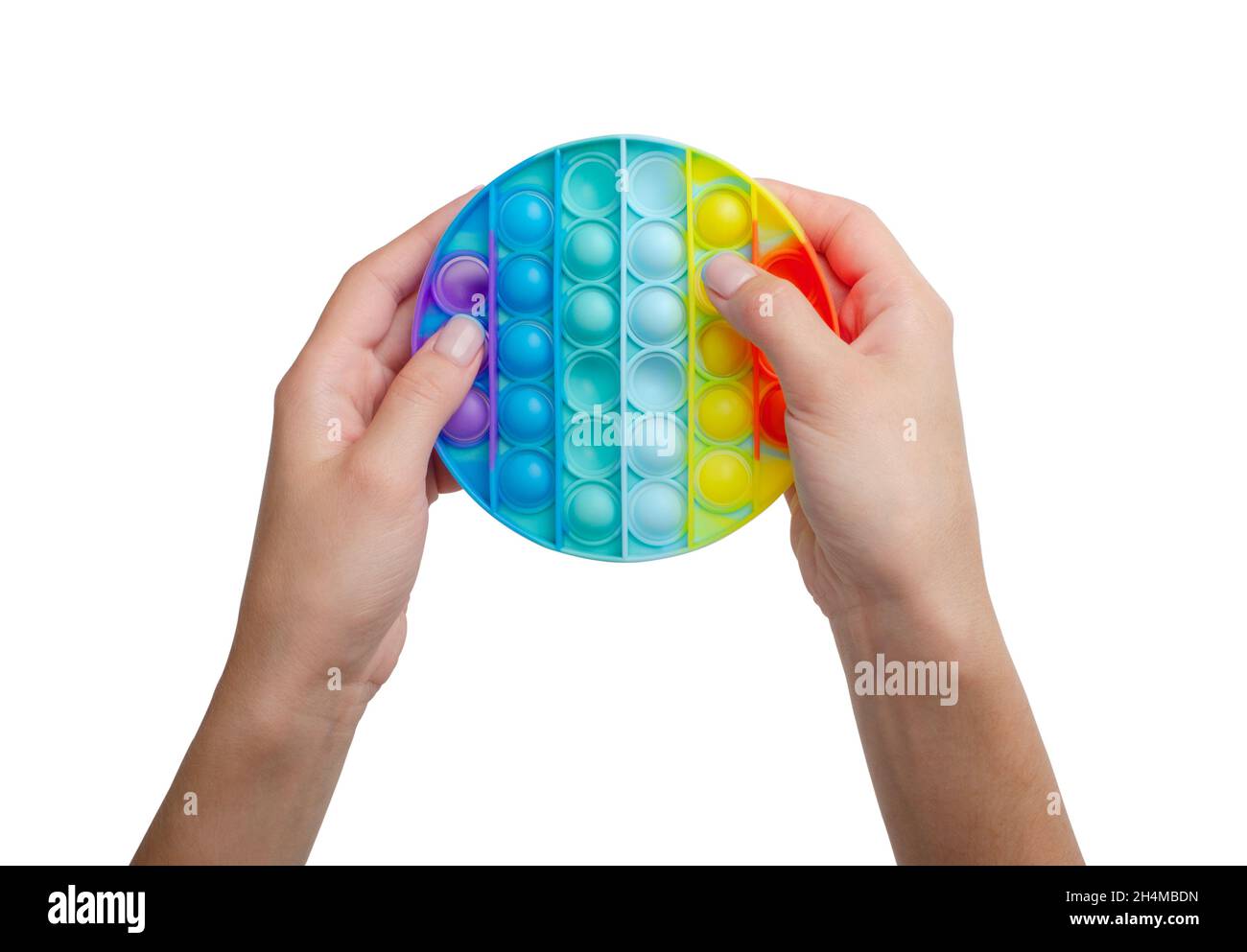 Bunte Antistress Sinnesspielzeug Fidget Push Pop es in Mädchen Händen isoliert auf einem weißen Hintergrund Stockfoto