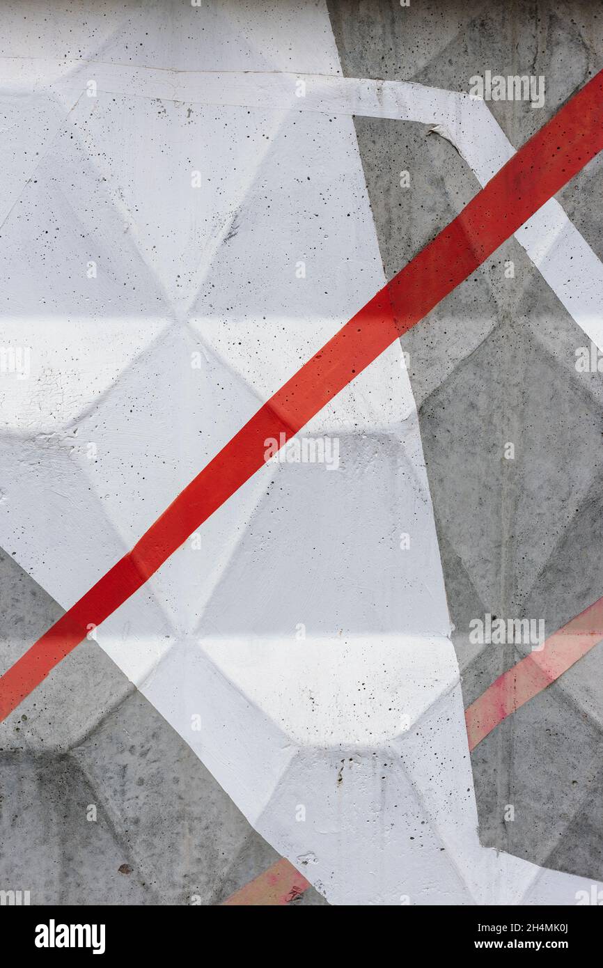 Rote und weiße Linien auf dem Zaun gezeichnet. Abstrakte Illustration. Stockfoto