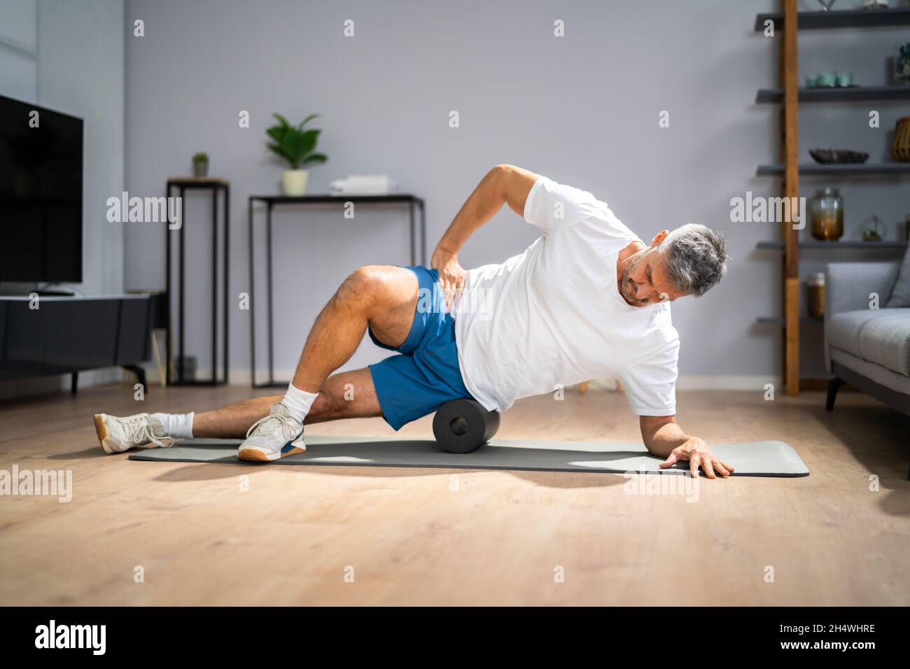 Foam Roller Healthy Leg Workout Sporttraining Auf Dem Boden Stockfoto