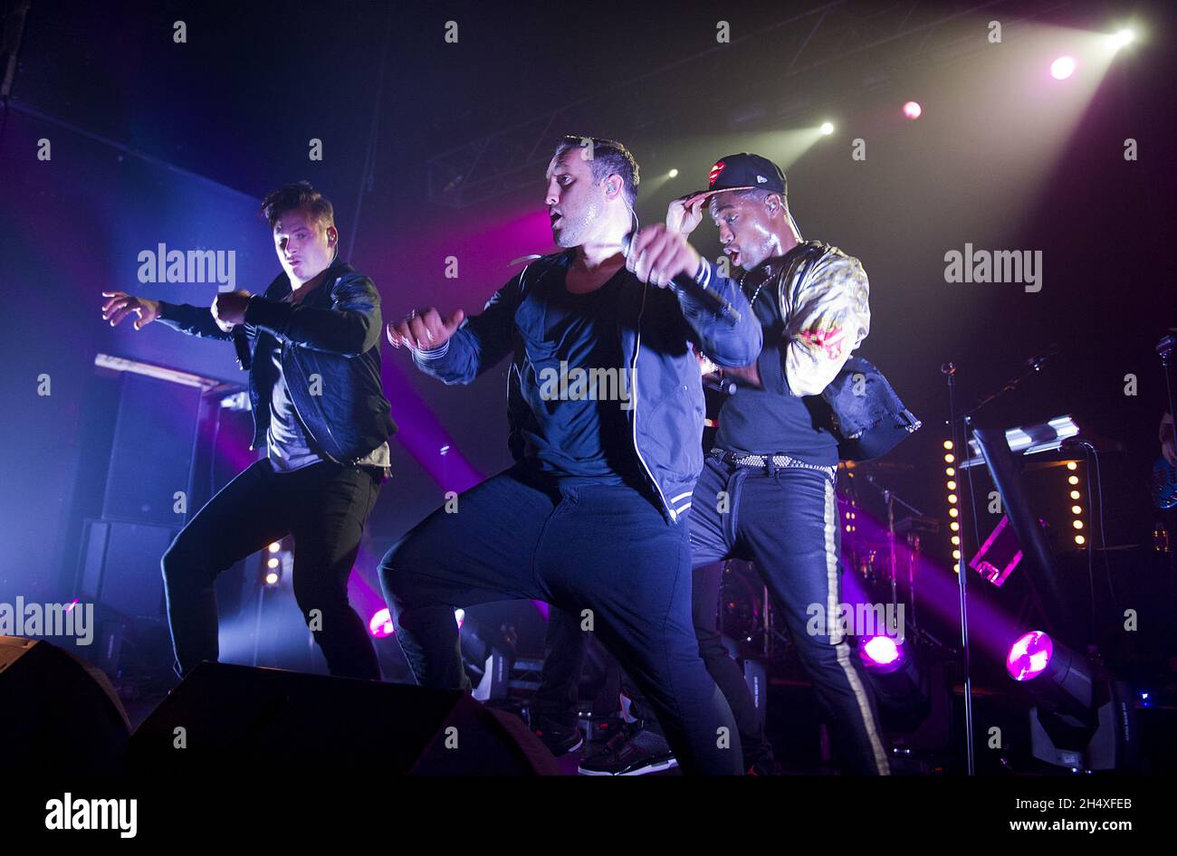 Antony Costa, Simon Webbe und Lee Ryan von Blue treten live auf der Bühne des Institute in Birmingham auf. Stockfoto