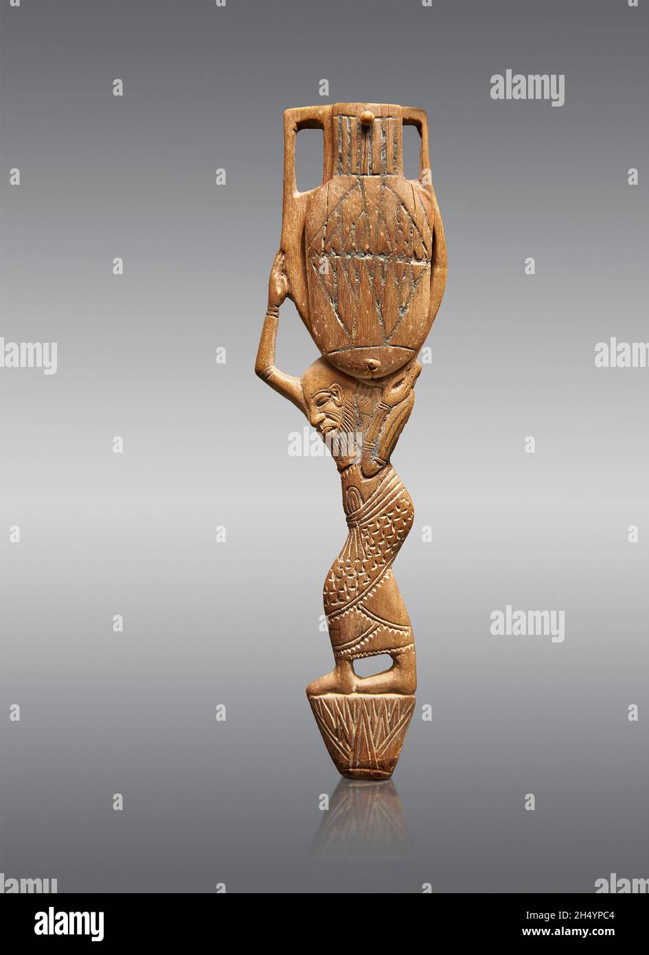 Alte ägyptische Holz kosmetischen Schattenlöffel eines Dieners trägt eine Amphore, 1550-1069 v. Chr., New Empire, Akazie. Löffel . Louvre Museum N1738 oder LP320 Stockfoto