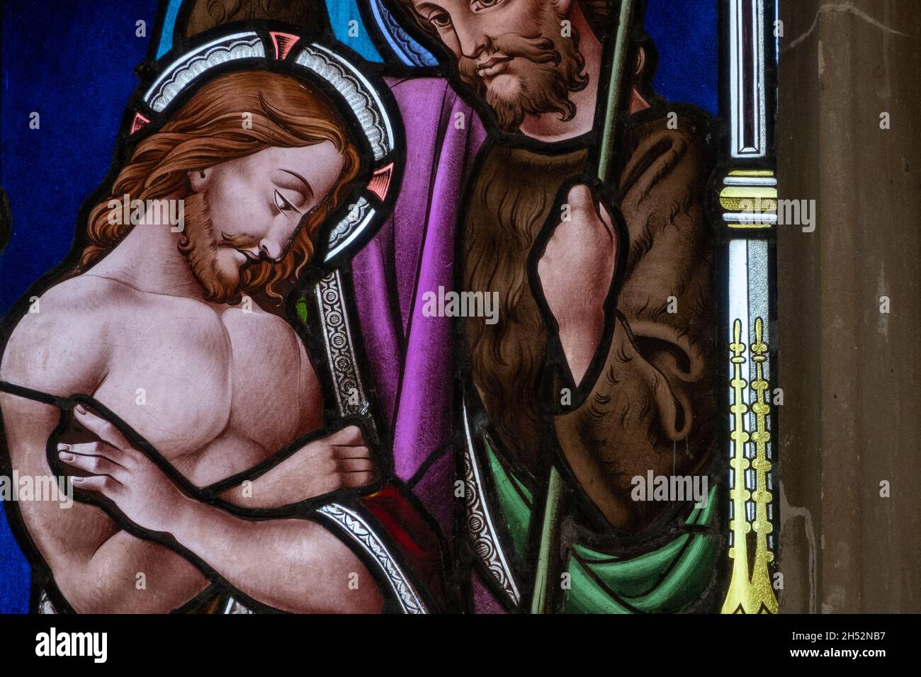 Details aus einem Buntglasfenster mit Christus in der St. Andrew's Church Marlesford, Suffolk, Großbritannien Stockfoto