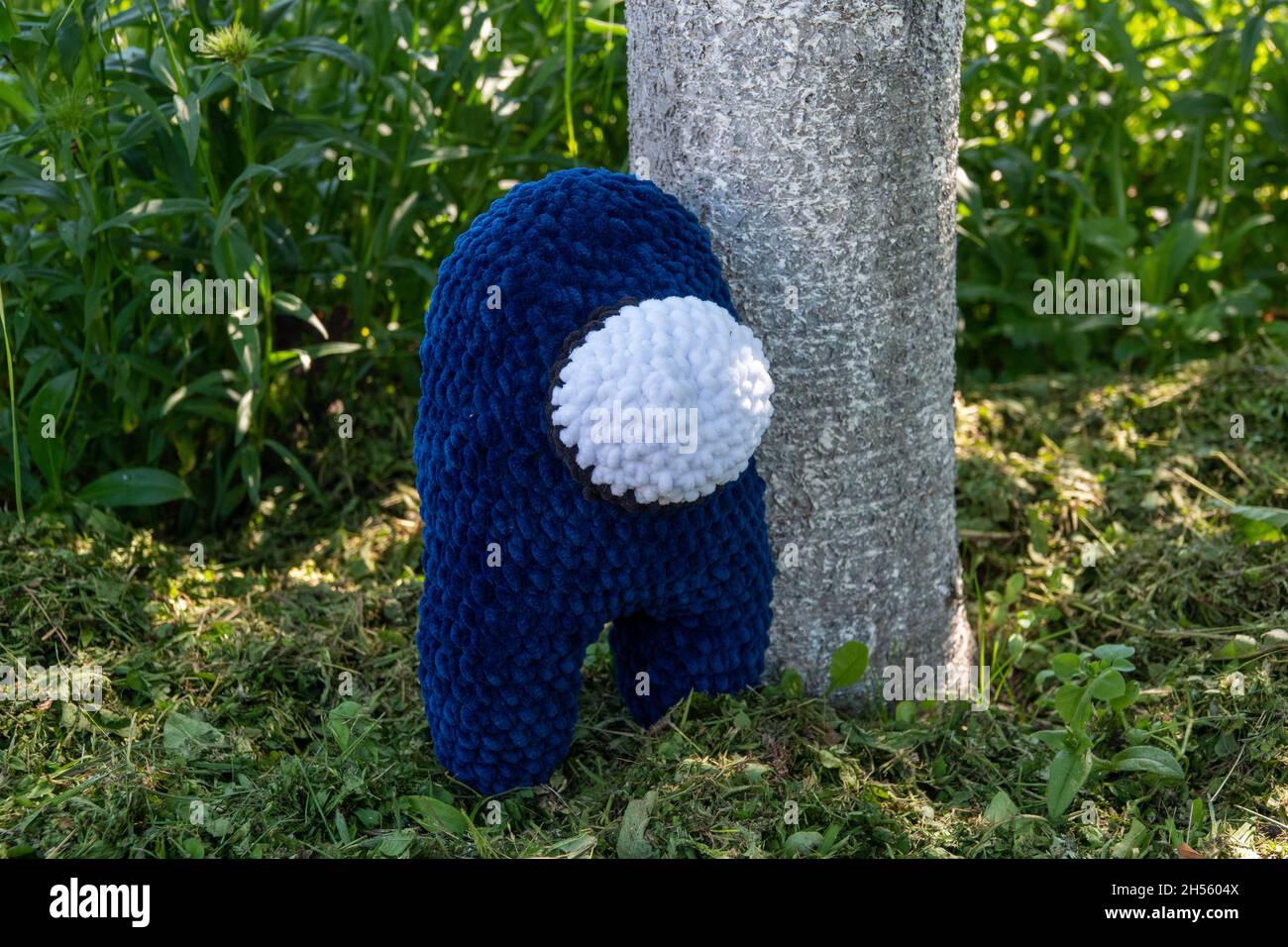 Plüsch Häkelspielzeug amigurumi unter uns Stockfoto