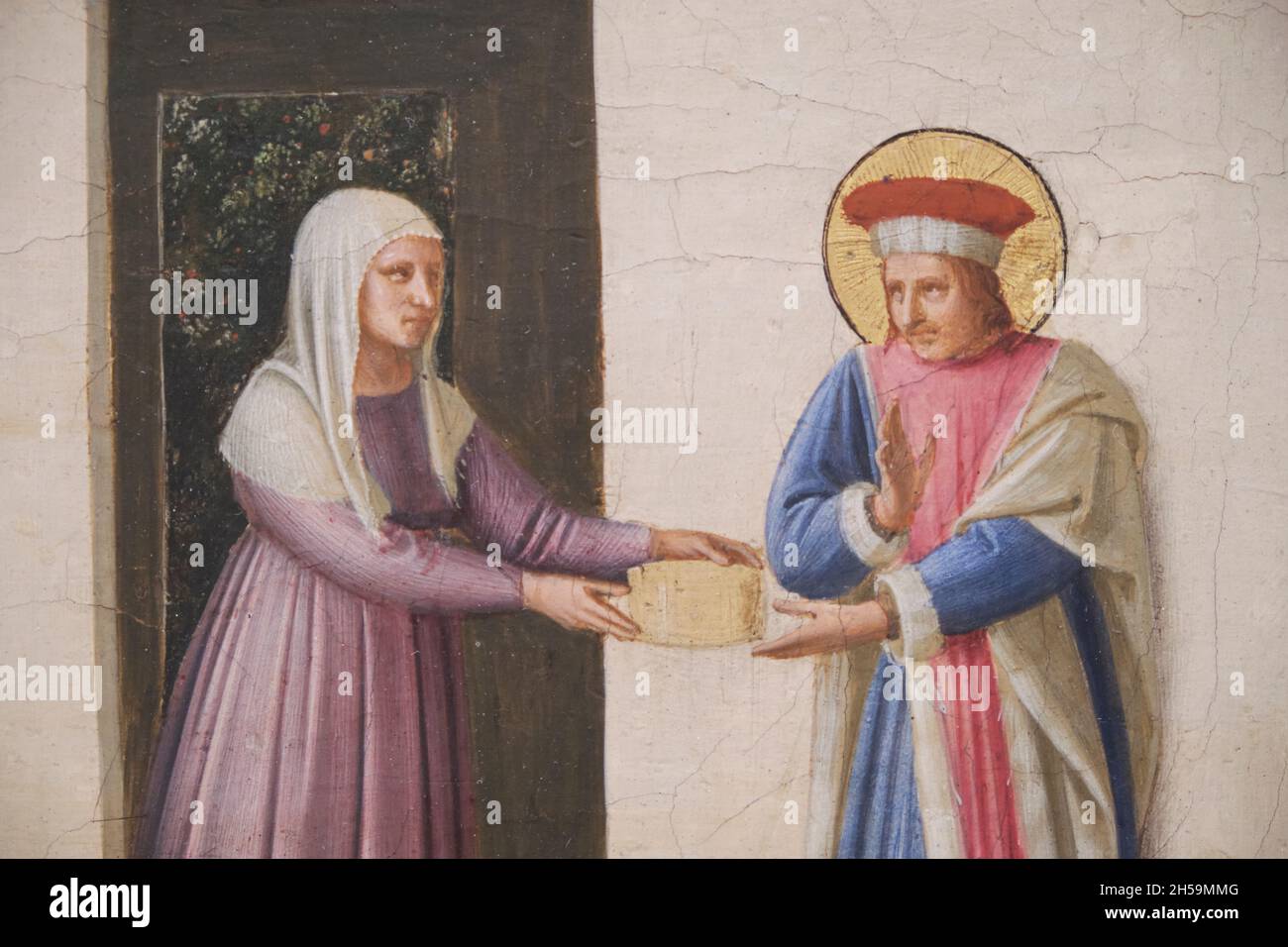 Detail des Gebens in einem Tempera-Gemälde mit dem Titel The Healing of Palladi von Saint Cosmas und Saint Damian von der italienischen Künstlerin Fra Angelico. An der Natio Stockfoto