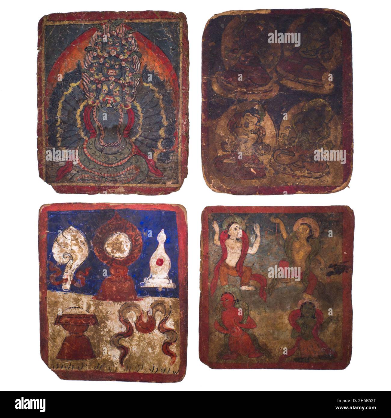 Set aus vier antiken tibetischen oder mongolischen buddhistischen Tsakli-Initiationskarten. 19. Jahrhundert oder früher Stockfoto