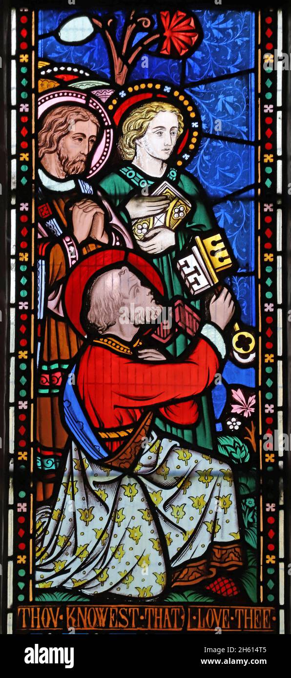 Ein Buntglasfenster von Frederick Preedy mit Darstellungen von Acts of Mercy, St. Andrew's Church, Cleeve Prior, Worcestershire Stockfoto