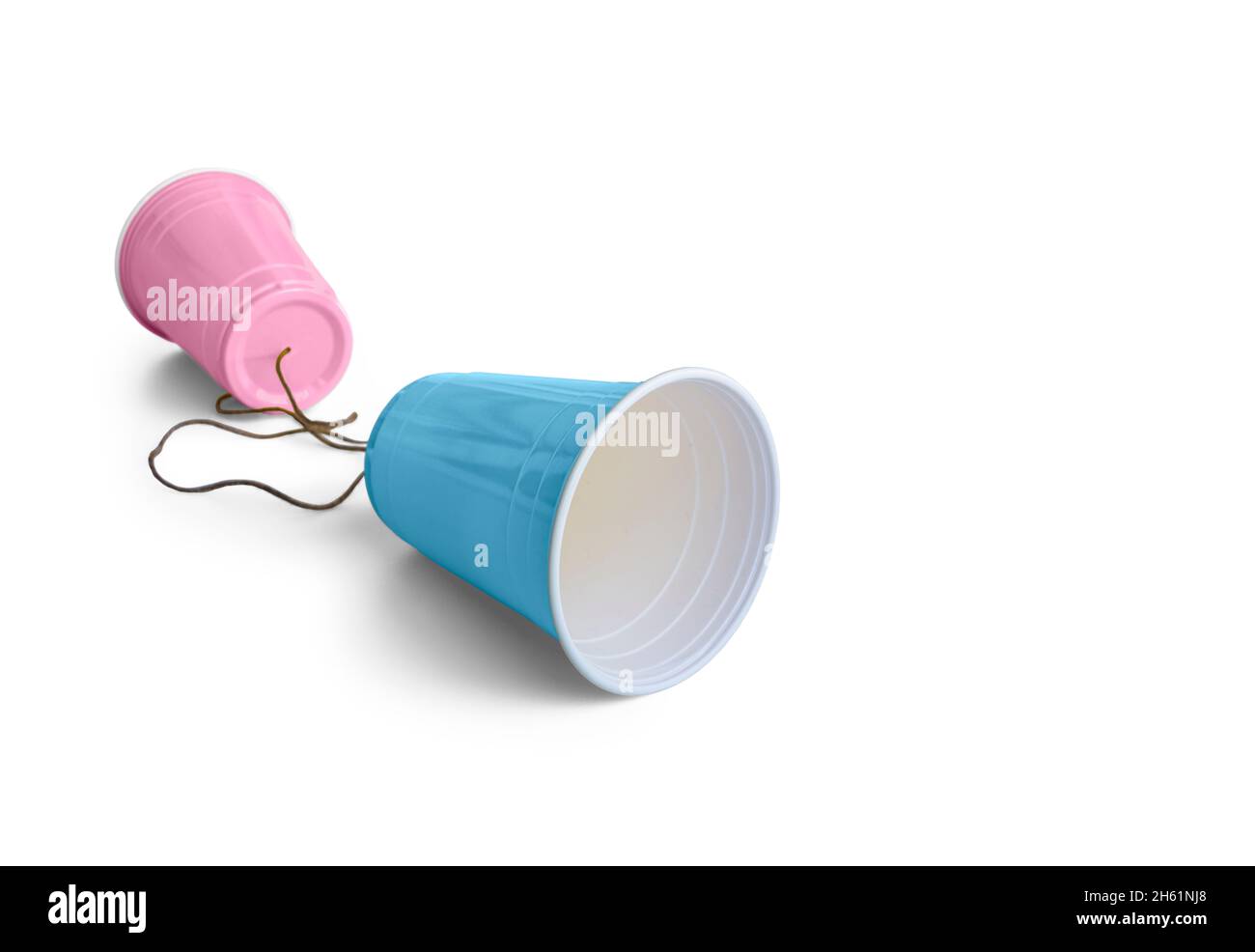 Comunication rosa & blau Kunststoff-Tasse mit Schnur Stockfoto