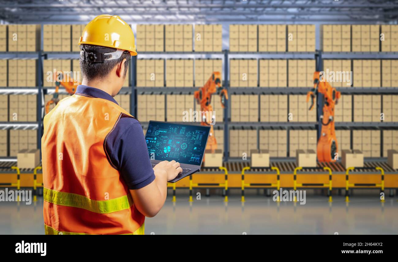 Techniker steuern 3d-Rendering-Automatisierungsroboter im Werk Stockfoto