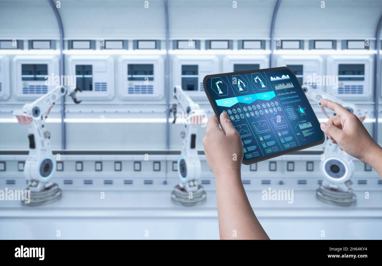 Techniker steuern 3d-Rendering-Automatisierungsroboter im Werk Stockfoto