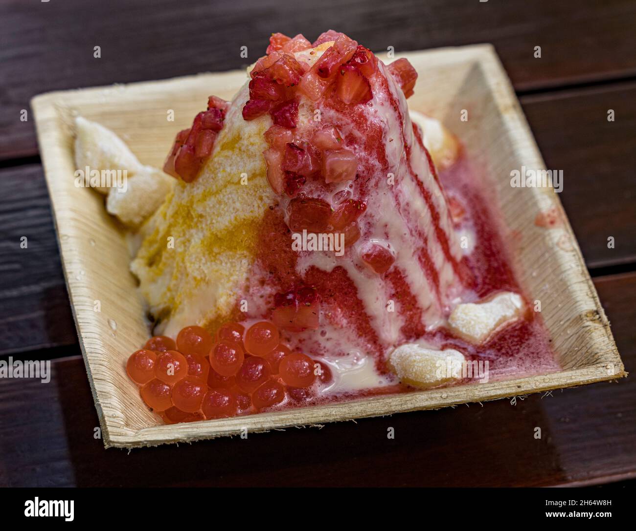 Das Rasieren von Eis mit Eis ist ein beliebtes Vergnügen auf Oahu, Hawaii. Stockfoto