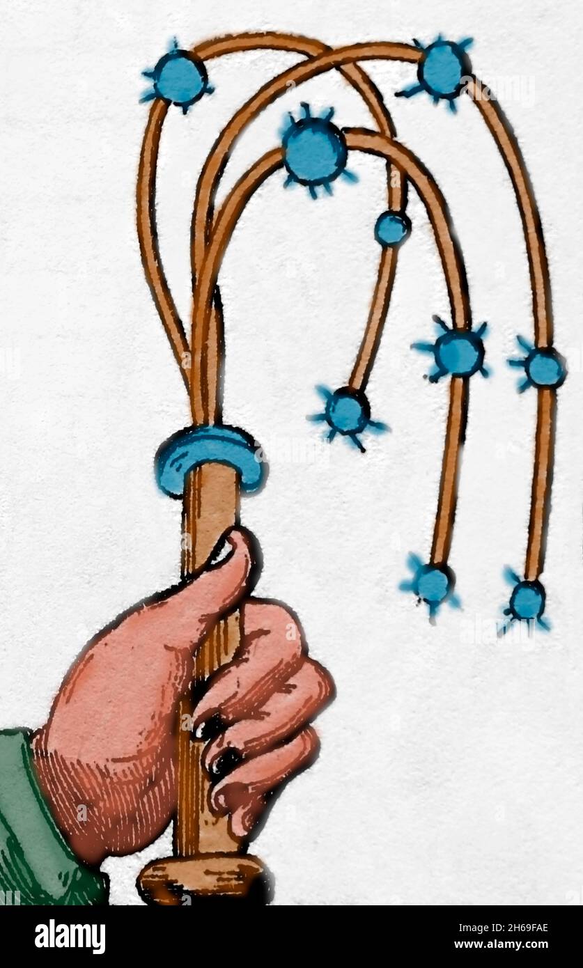 Ein Instrument aus verknoteten Schnüren, das an einem Griff befestigt ist