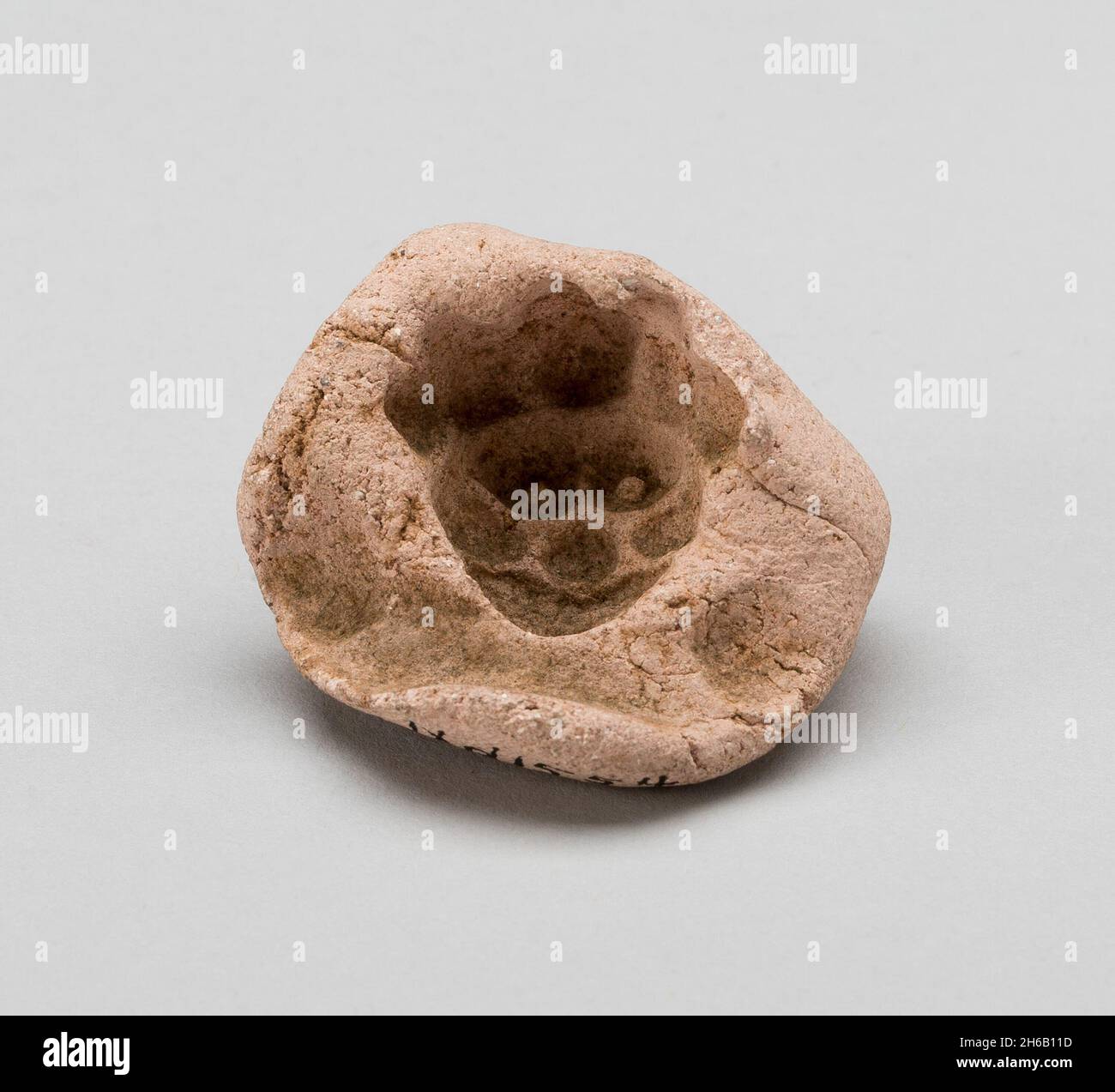 Schimmel für Gesicht von Figurine, c. 100/600. Stockfoto