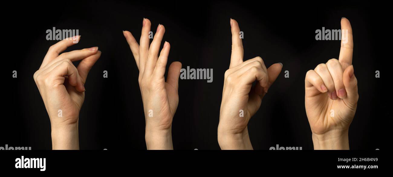 Handgesten auf schwarzem Hintergrund. Frauenhand, Geschäftsschilder, Banner Stockfoto