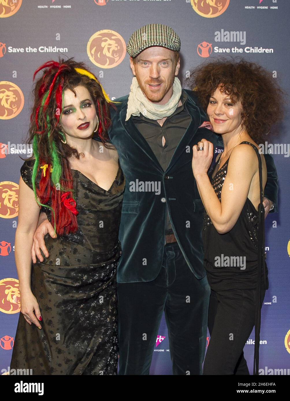 Helena Bonham Carter, Damien Lewis und Helen McCrory kommen bei der von RB gesponserten Spendenveranstaltung Save the Children's Night of Reggae an, die am Mittwoch, den 12. März 2014, im Roundhouse in London stattfand, um Geld für die lebensrettende Arbeit der Wohltätigkeitsorganisation zu sammeln. Stockfoto