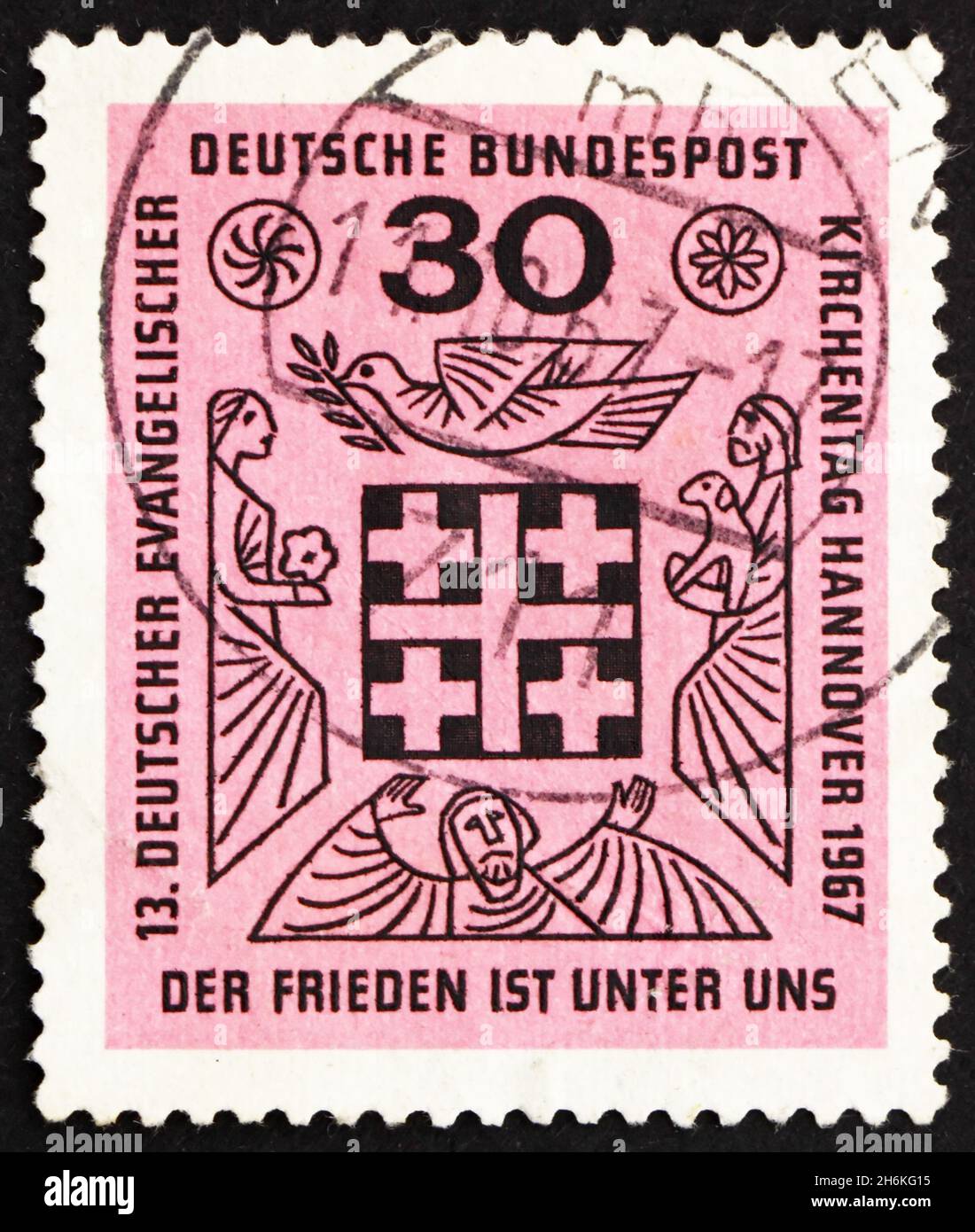 DEUTSCHLAND - UM 1967: Eine in Deutschland gedruckte Marke zeigt Peace is among US, 13. Treffen deutscher Protestanten, Hannover, um 1967 Stockfoto