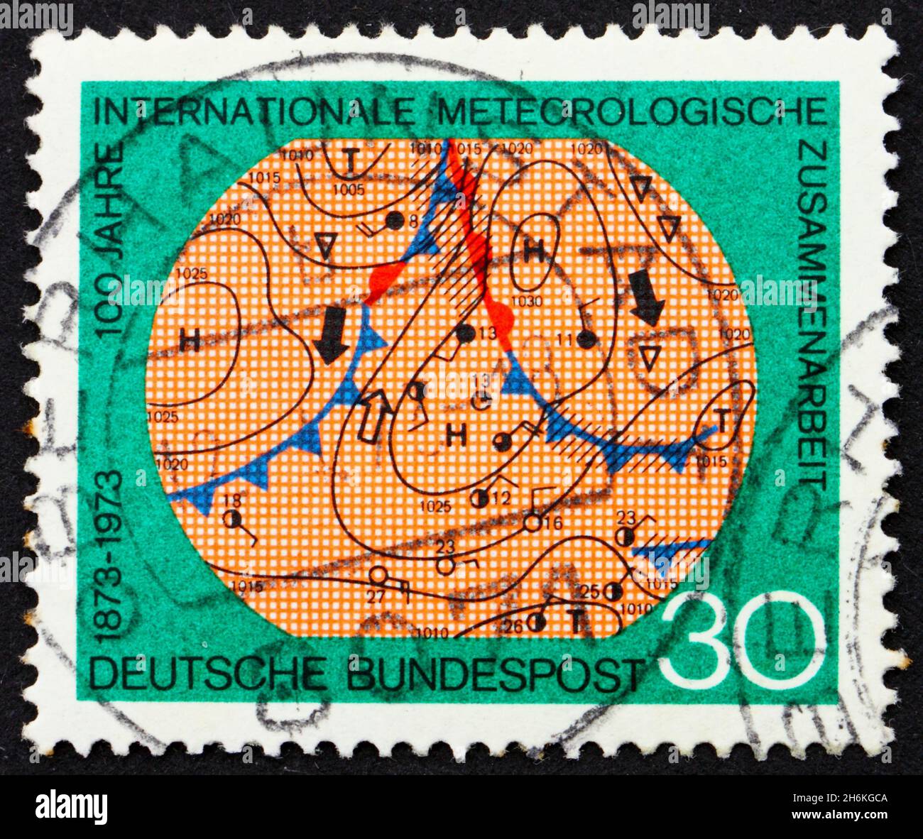 DEUTSCHLAND - UM 1973: Eine in Deutschland gedruckte Marke zeigt eine Meteorologische Karte, hundertjähriges Jubiläum der internationalen meteorologischen Zusammenarbeit, um 1973 Stockfoto
