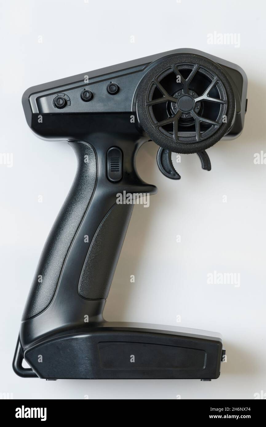Fernbedienung mit Rad und Knöpfen isoliert auf Studio-Hintergrund Stockfoto