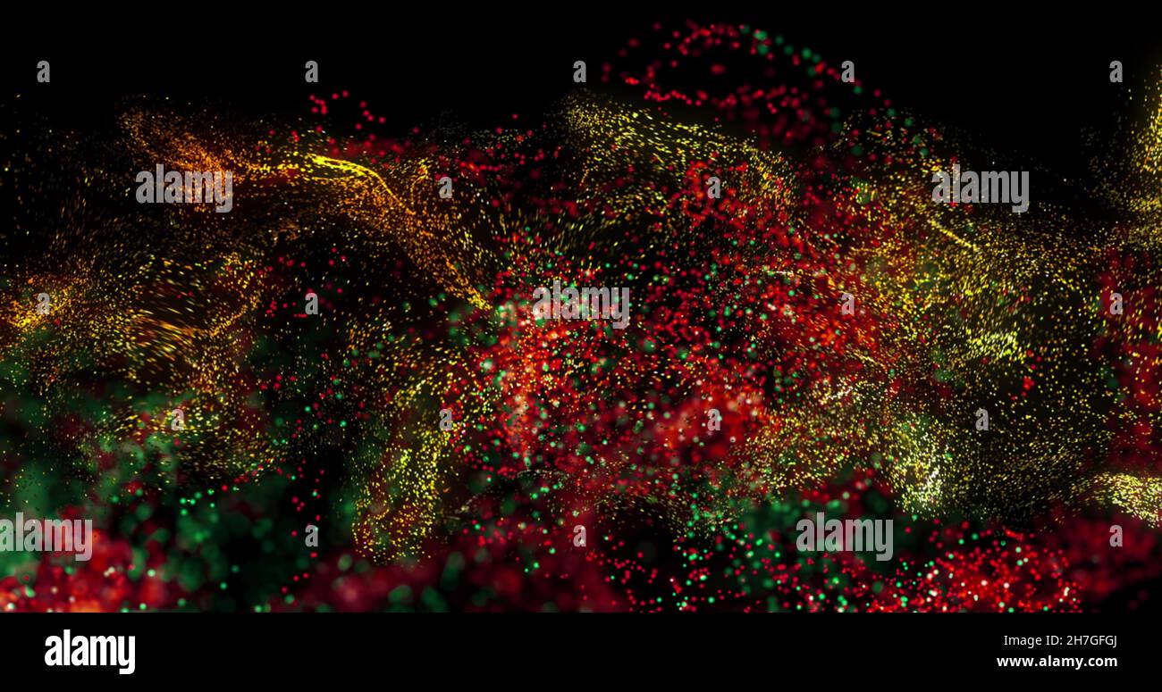 Bild einer roten, gelben und blauen Partikelwolke auf schwarzem Hintergrund Stockfoto