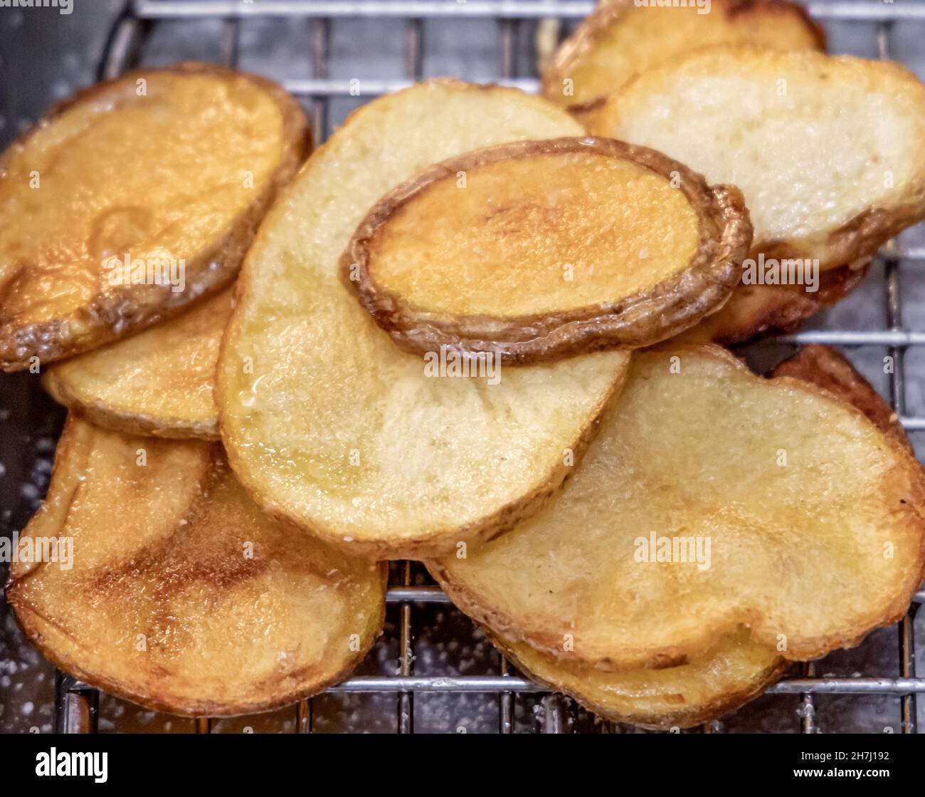 Frisch gebratene Kartoffelscheiben Stockfoto