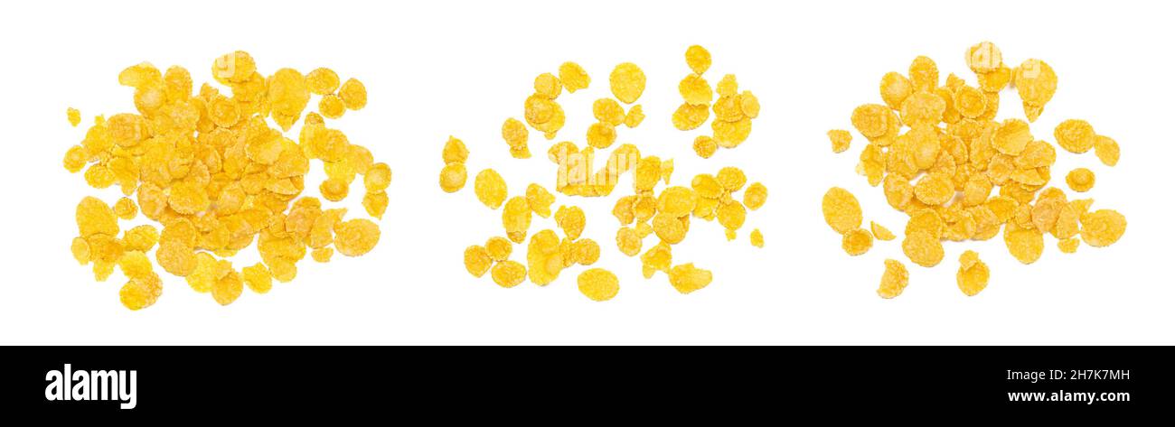 Draufsicht auf goldgelb knusprige Maisflocken Getreidehaufen isoliert auf weißem Hintergrund gesetzt. Stockfoto