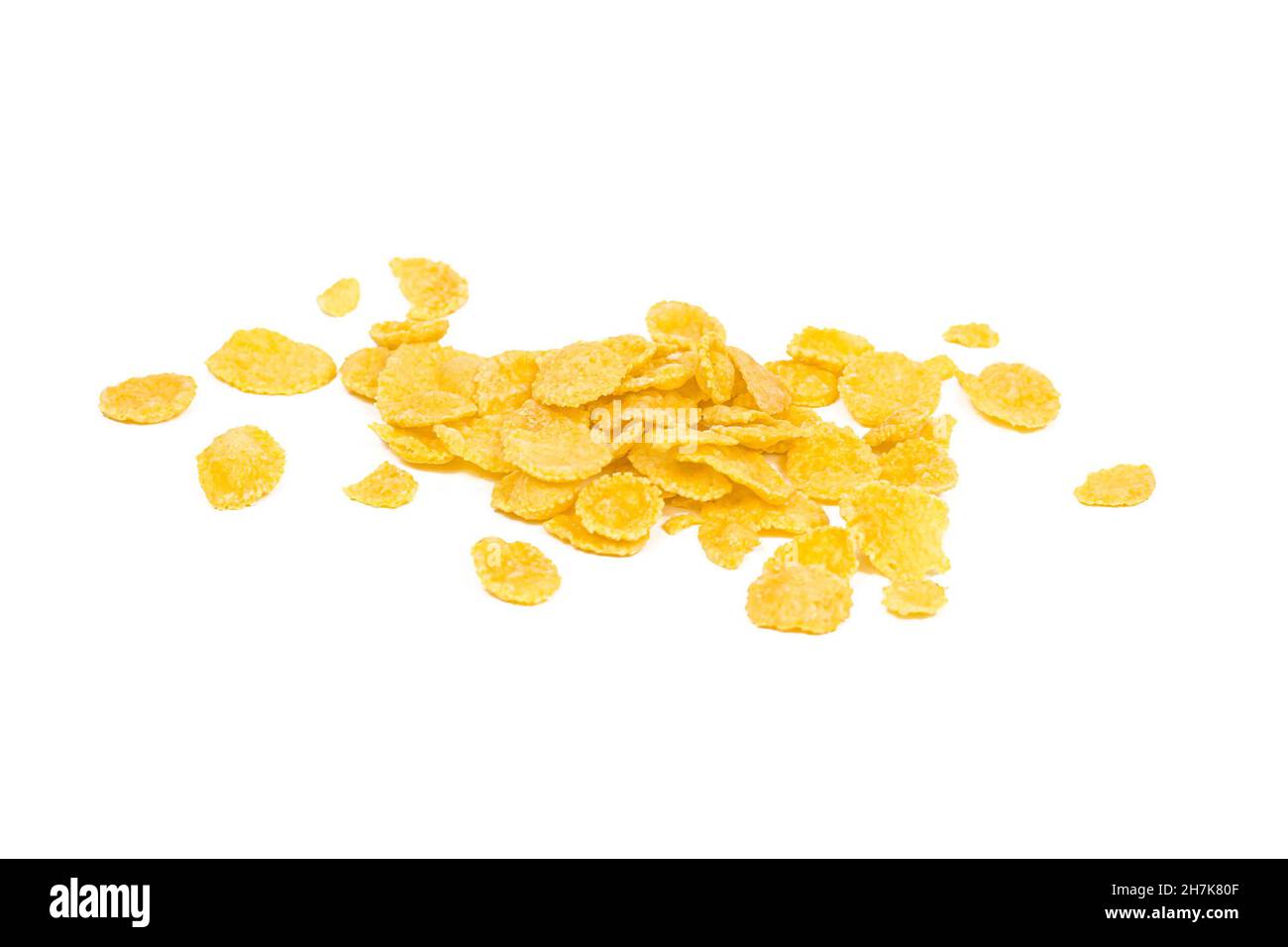 Goldgelb knusprige Maisflocken Getreidehaufen isoliert auf weißem Hintergrund. Stockfoto