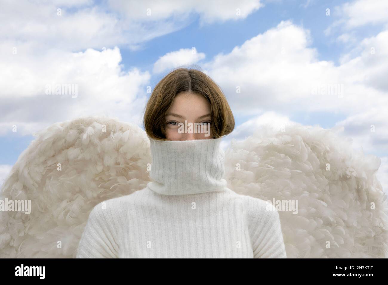 Teenage Angel mit verdecktem Gesicht Stockfoto