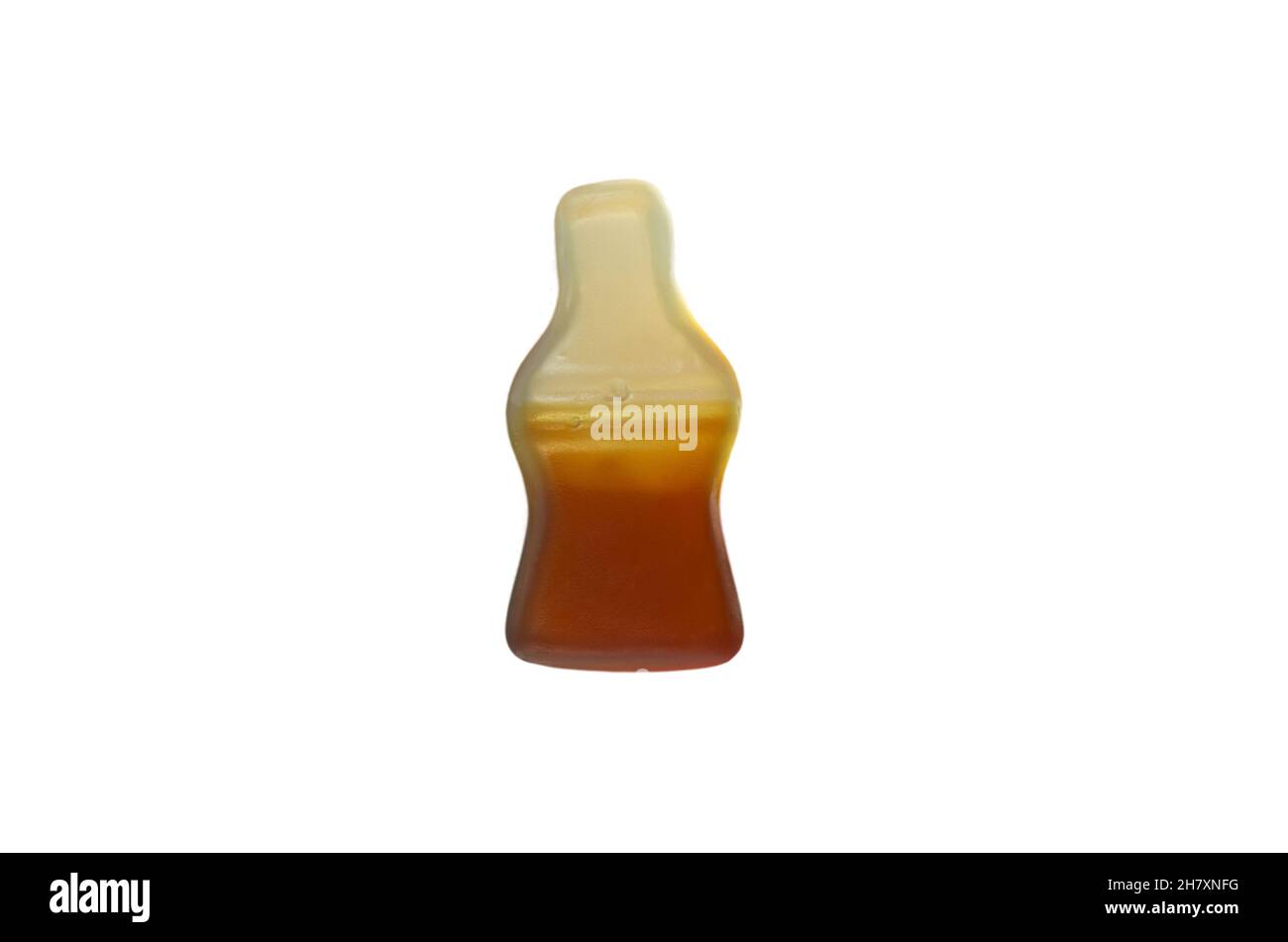 Cola aromatisierte Gummipuppe jellie in Form einer Colaflasche, isoliert auf weißem Hintergrund. - Bild Stockfoto
