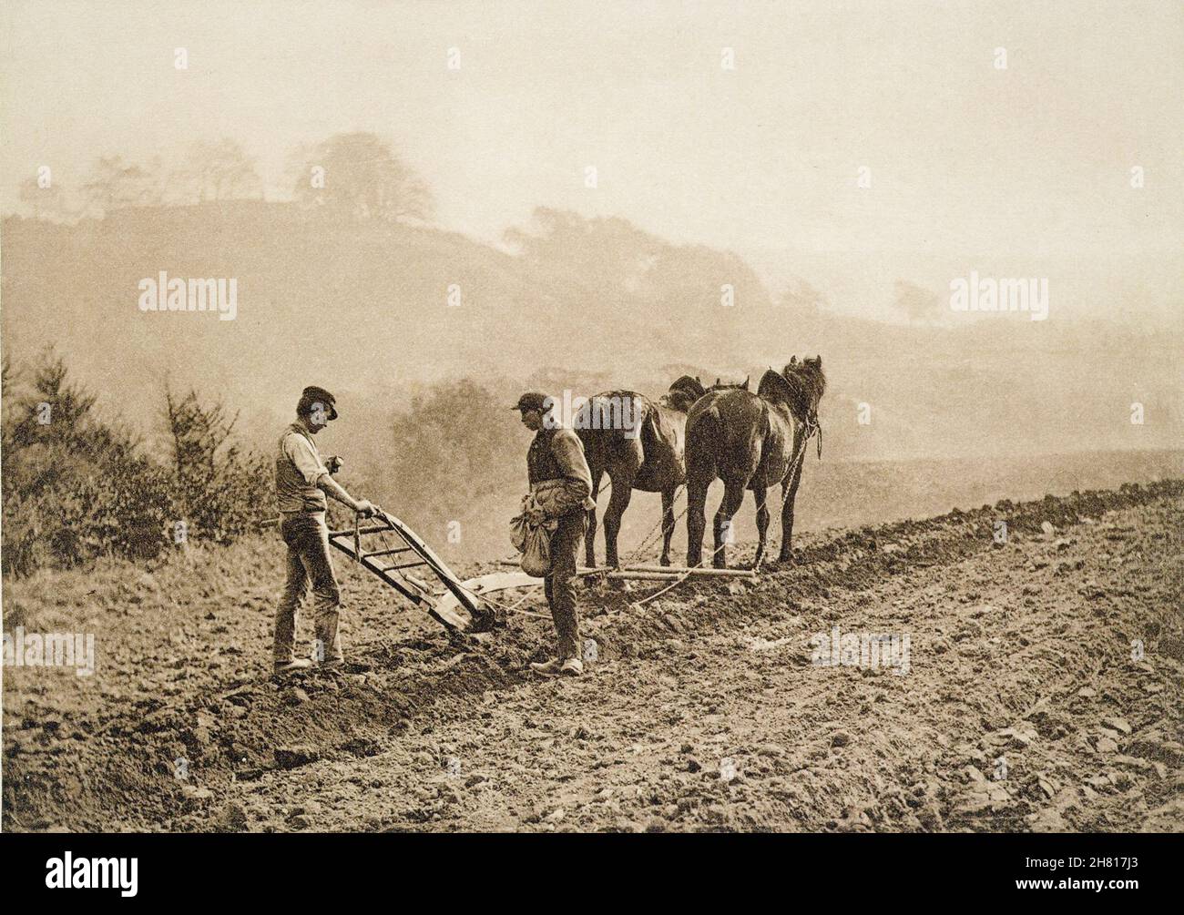 Frank Meadow Sutcliffe - Abendessen - Landarbeiter machen eine Pause - 1889-1891 Uhr Stockfoto