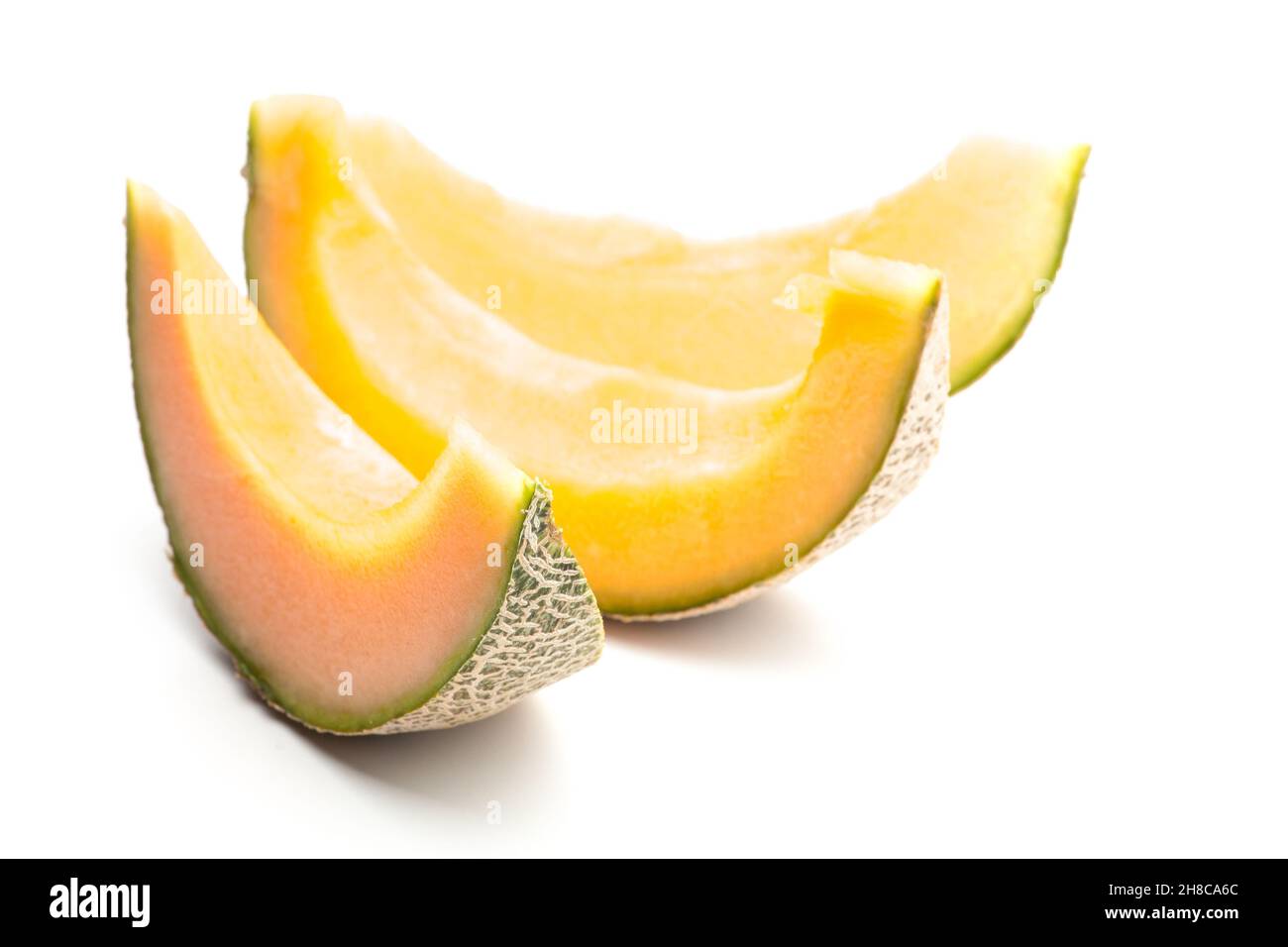 Melone, aufgeschnitten, Spalten, vernetzte Melone, orange, Scheiben, Cantaloupe, Obst, süß, drei, Vitamin, fettfrei, Melonen, Rohkost, Säule, Farbe, Netz, Rücken Stockfoto