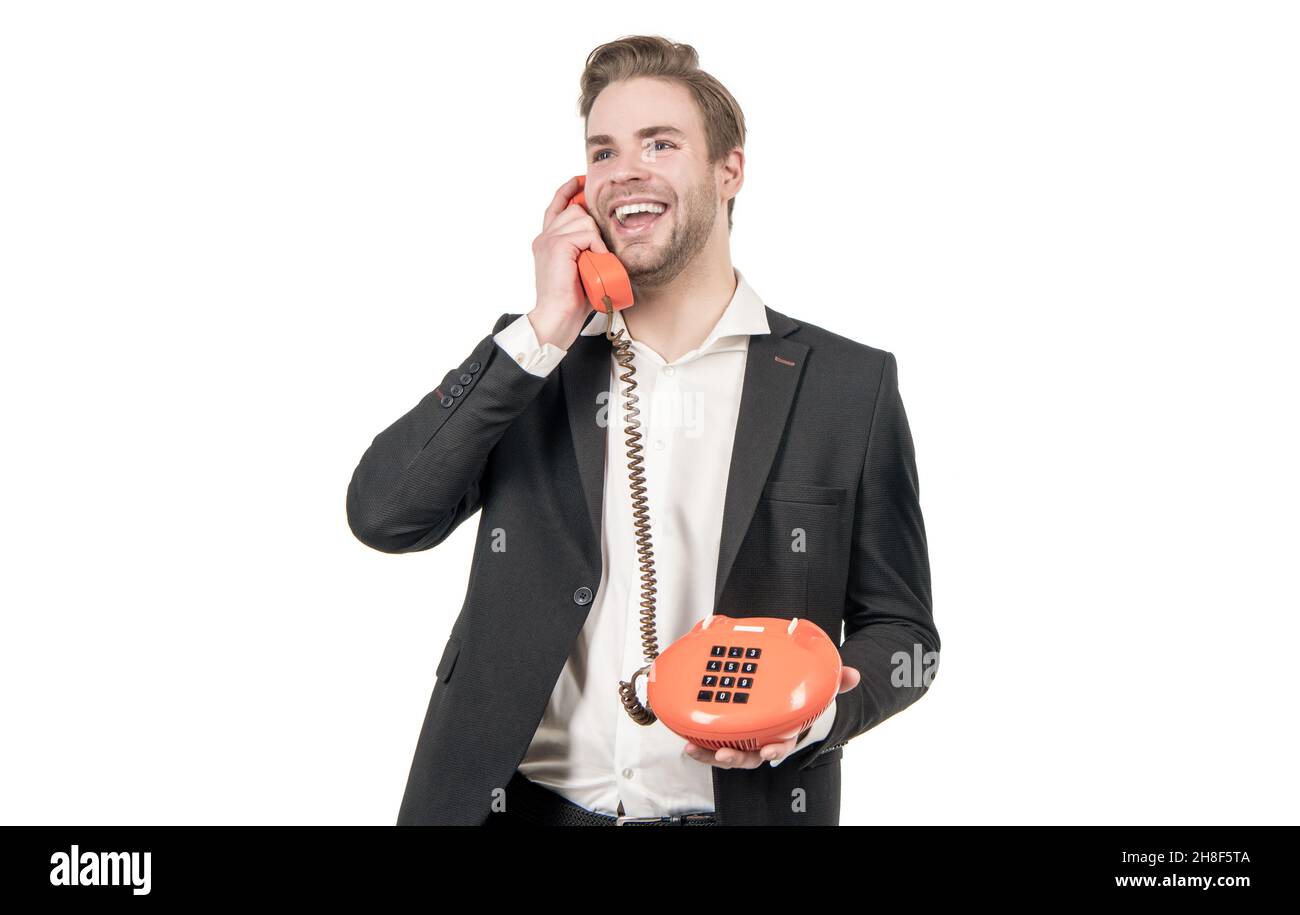 Hallo. Glücklicher Telefonanruf-Manager. Glücklicher Mann ist auf Vintage-Handy. Telefonanruf Stockfoto