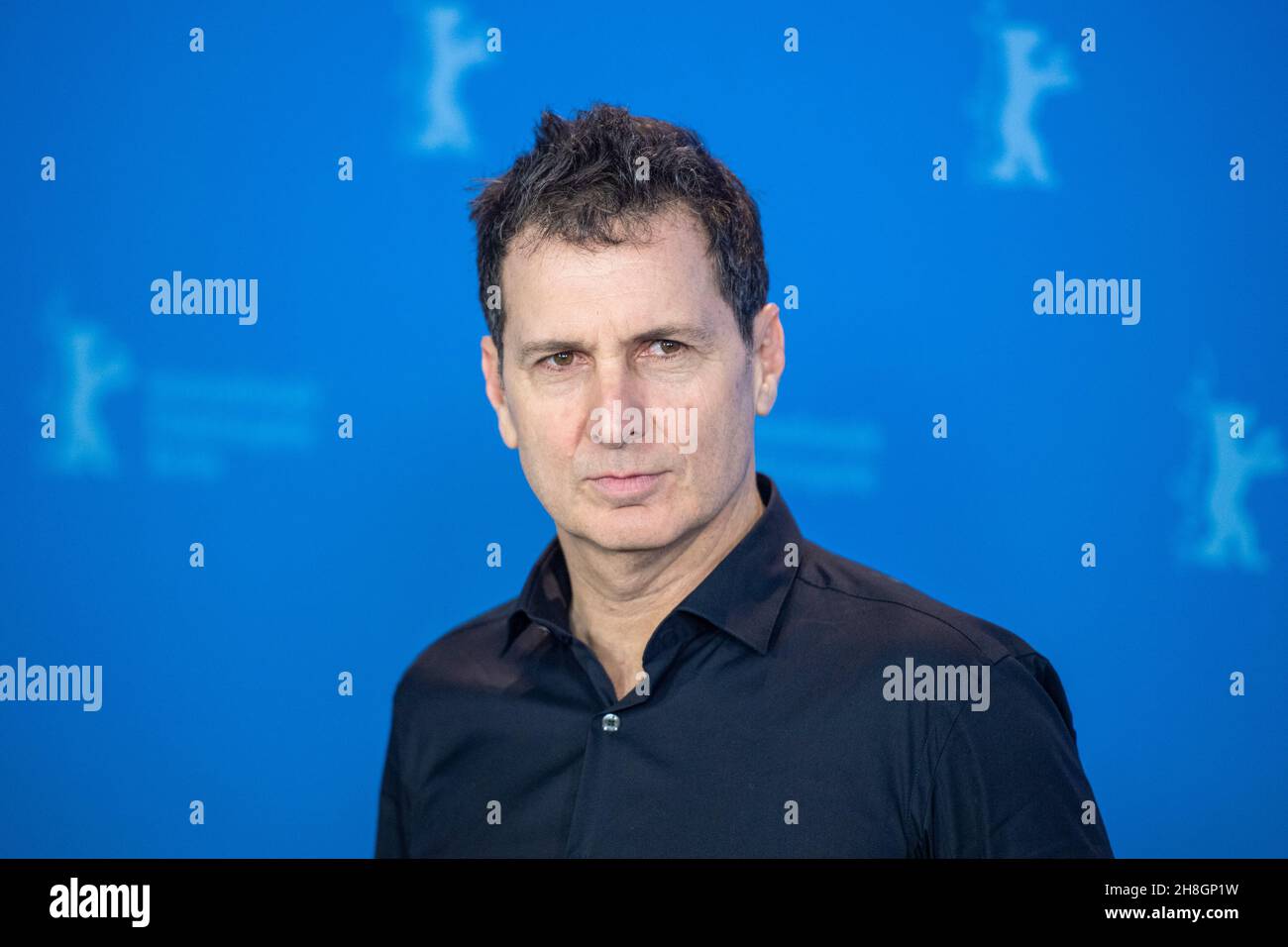 BERLIN, DEUTSCHLAND-Februar 10: Yuval Adler posiert bei der Fotoschau „The operative“ (die Agentin) während der Berlinale 69th Stockfoto