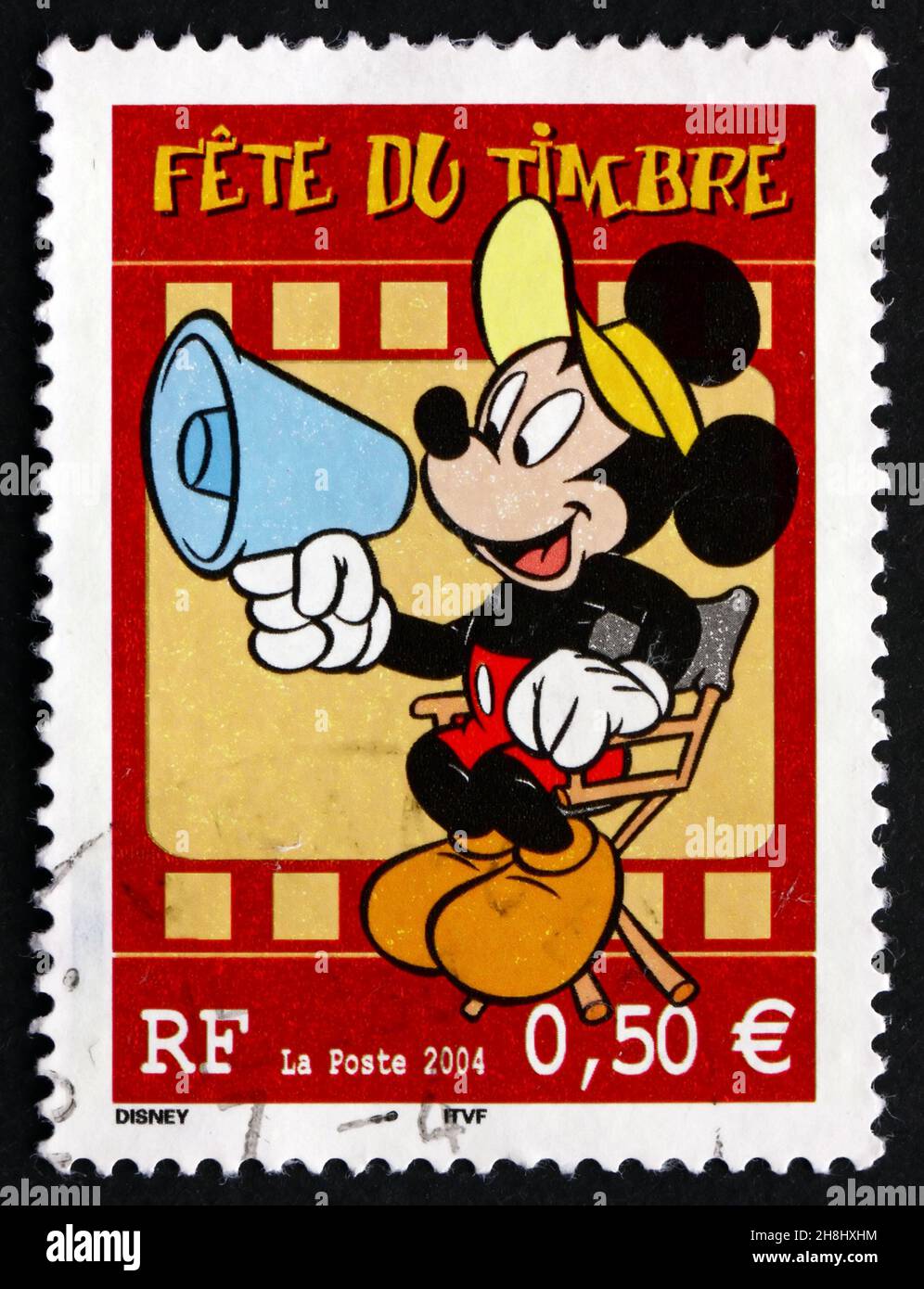 FRANKREICH - UM 2004: Eine in Frankreich gedruckte Marke zeigt Mickey Mouse, Comic Character von Walt Disney, um 2004 Stockfoto