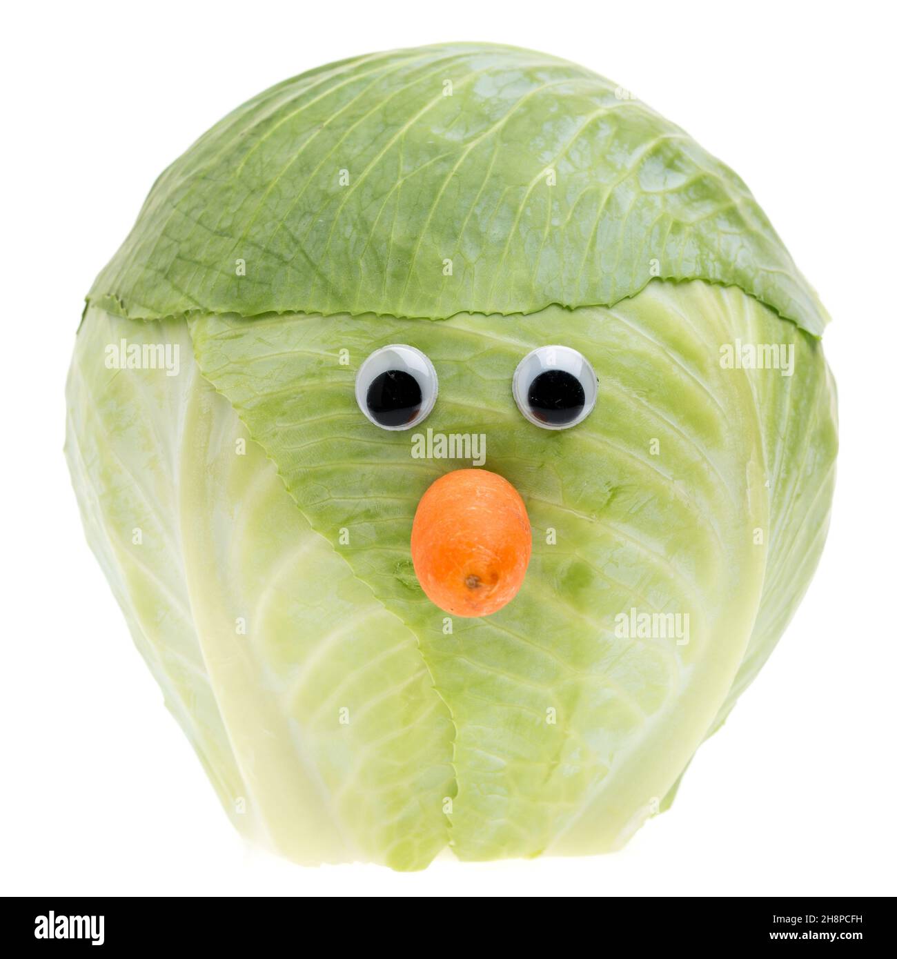 Ein lustiger Kräuter-Gesichtskohl, Weißkohl, Kohlkopf, Kopf, echt, Gemüse, Essen, Essen Stockfoto