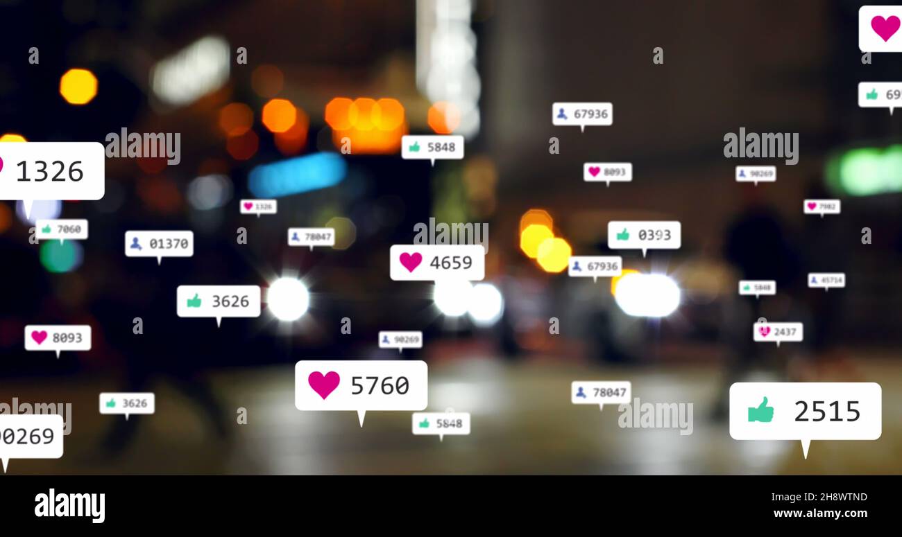 Bild von Social-Media-Symbolen und Zahlen über nicht fokussieren Stadt- und Auto-Lichter Stockfoto