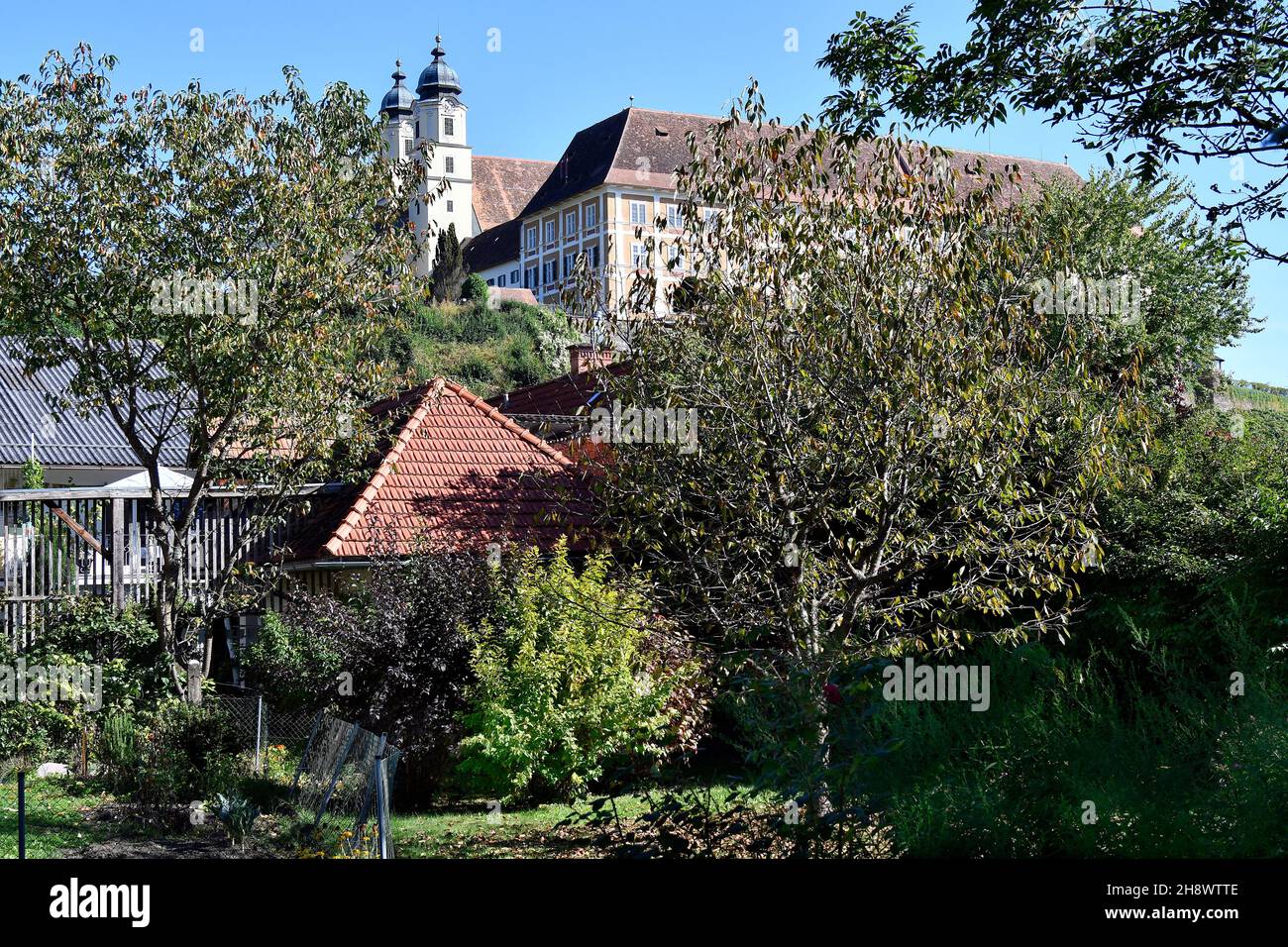 Stainz, Österreich - 23. September 2021: Das Schloss Stainz, ein ehemaliges Augustinerkloster mit Barockkirche, beherbergt heute ein Jagdmuseum und ein Agricu Stockfoto