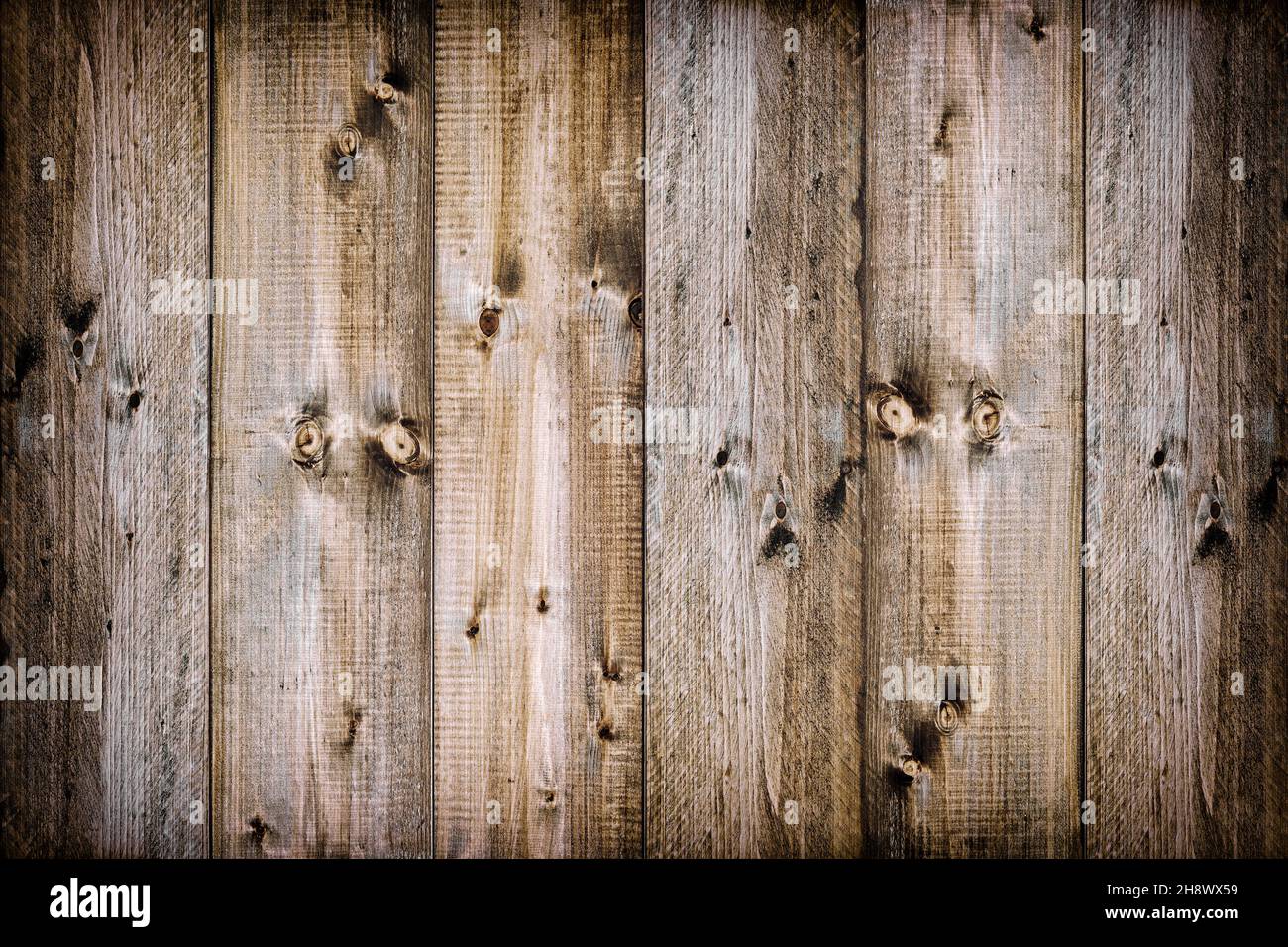 Rustikaler dunkler Holzhintergrund mit Vignette. Holzstruktur Stockfoto