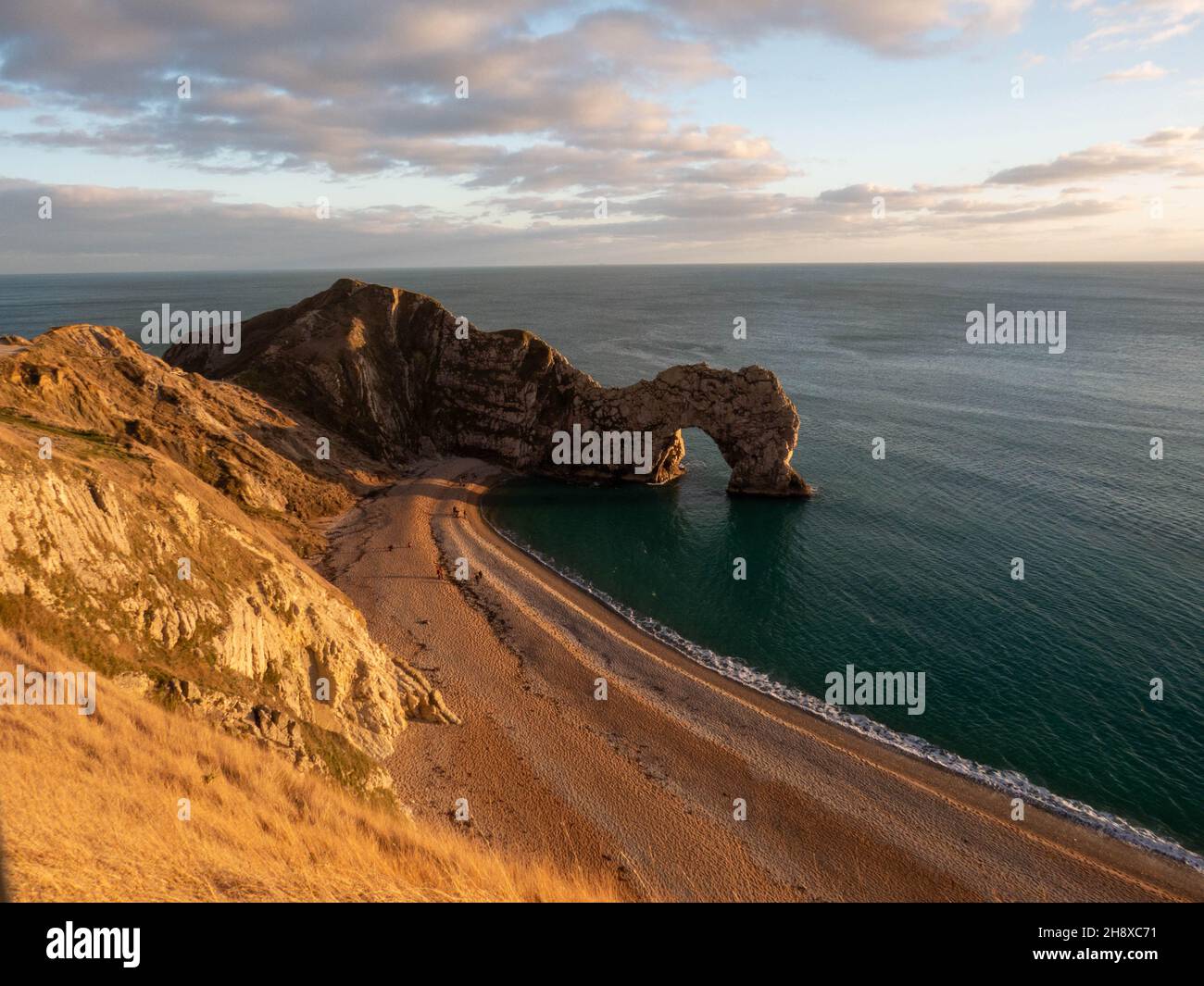 Durdle Door Jurassic Coastline Dorset England als die Sonne an einem Wintertag untergeht Stockfoto