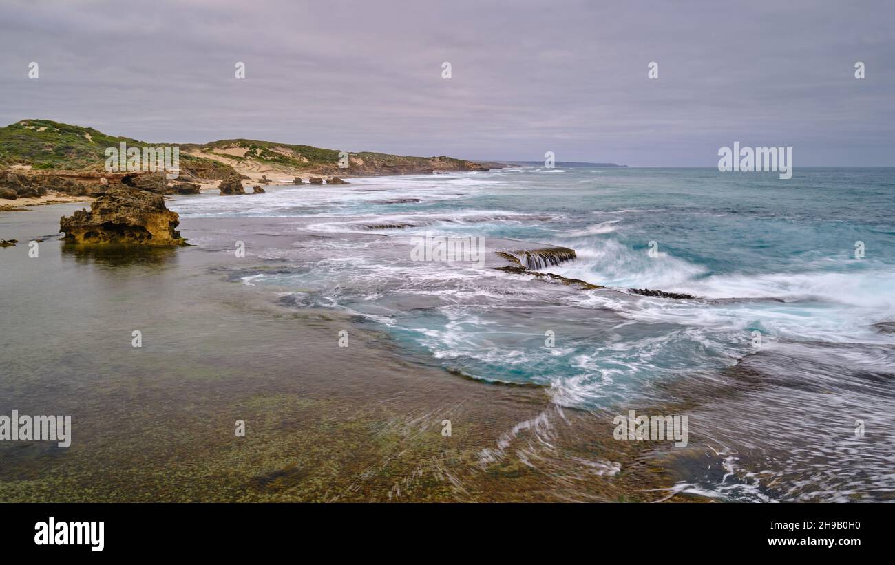 Montforts Beach Rock Shelf Stockfoto