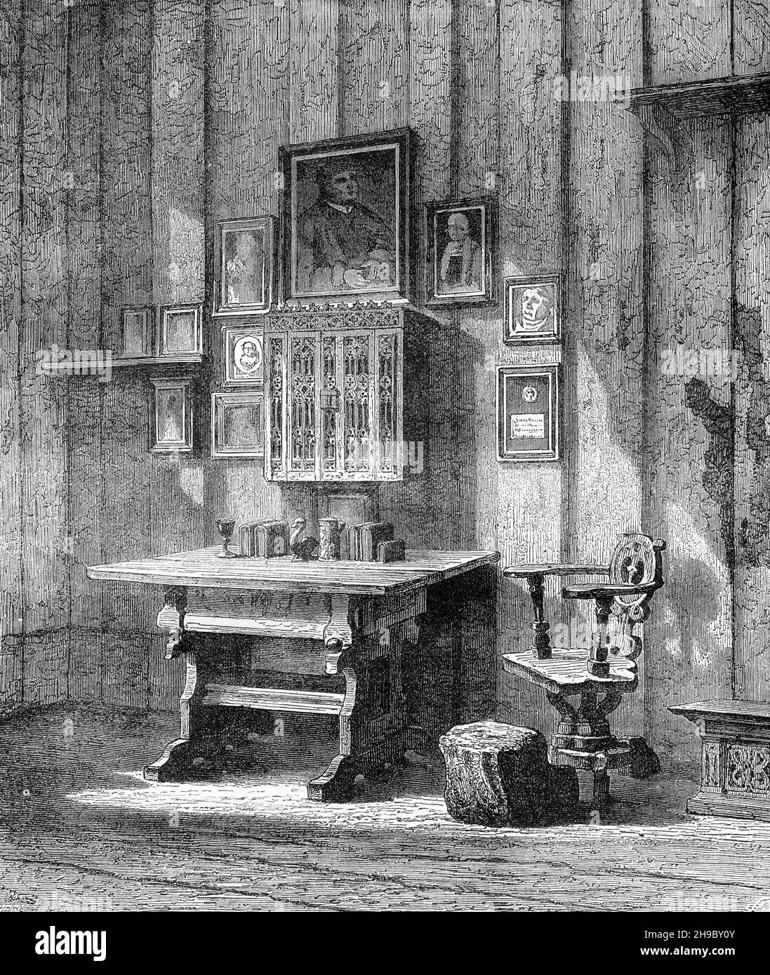 Stich von Martin Luthers Zimmer auf der Wartburg, zeigt den Tintenfleck auf dem Brunnen, wo er seine Tintenflasche auf den Teufel warf. Stockfoto