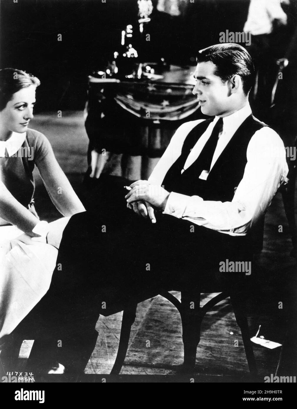 JOAN CRAWFORD und CLARK GIEBEL am Set offen während der Dreharbeiten von POSSESSED 1931 Regisseur CLARENCE BROWN Metro Goldwyn Mayer Stockfoto