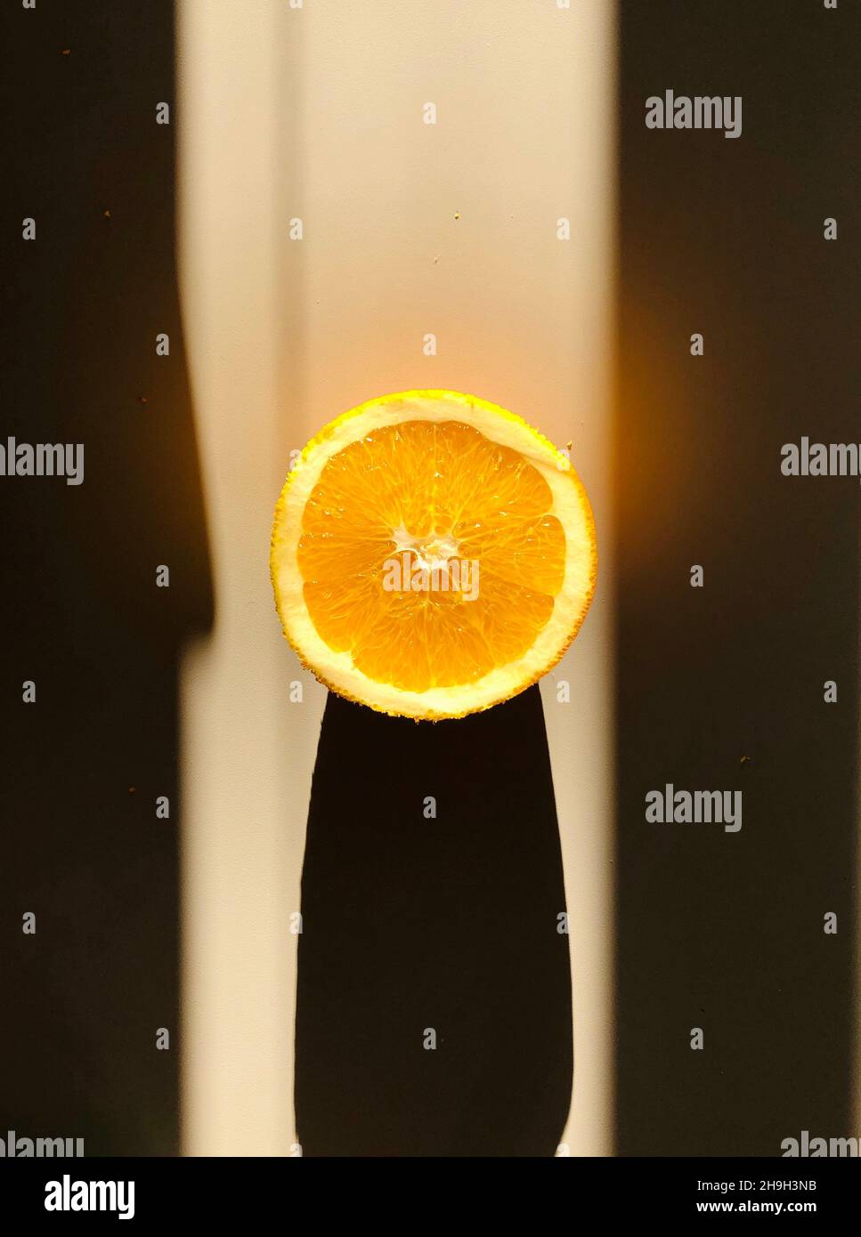 Die Hälfte einer Orange Stockfoto