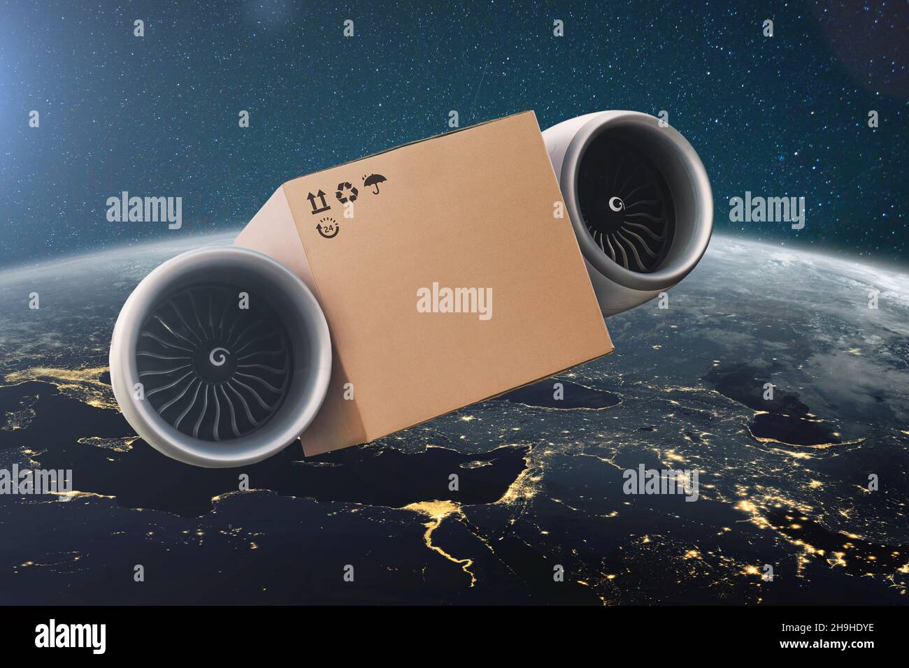 Fliegen auf Turbinen Karton. Superschnelles Express-Lieferkonzept. Lieferung von Fracht im Weltraum mit erstaunlichen blauen Planeten Erde. Stockfoto