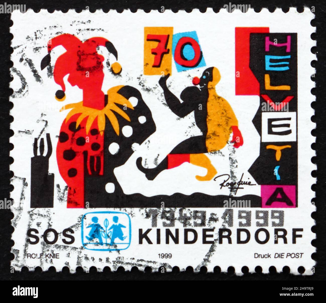 SCHWEIZ - UM 1999: Eine in der Schweiz gedruckte Marke zeigt SOS-Kinderdorf, Wabern, 50th. Jahrestag, um 1999 Stockfoto