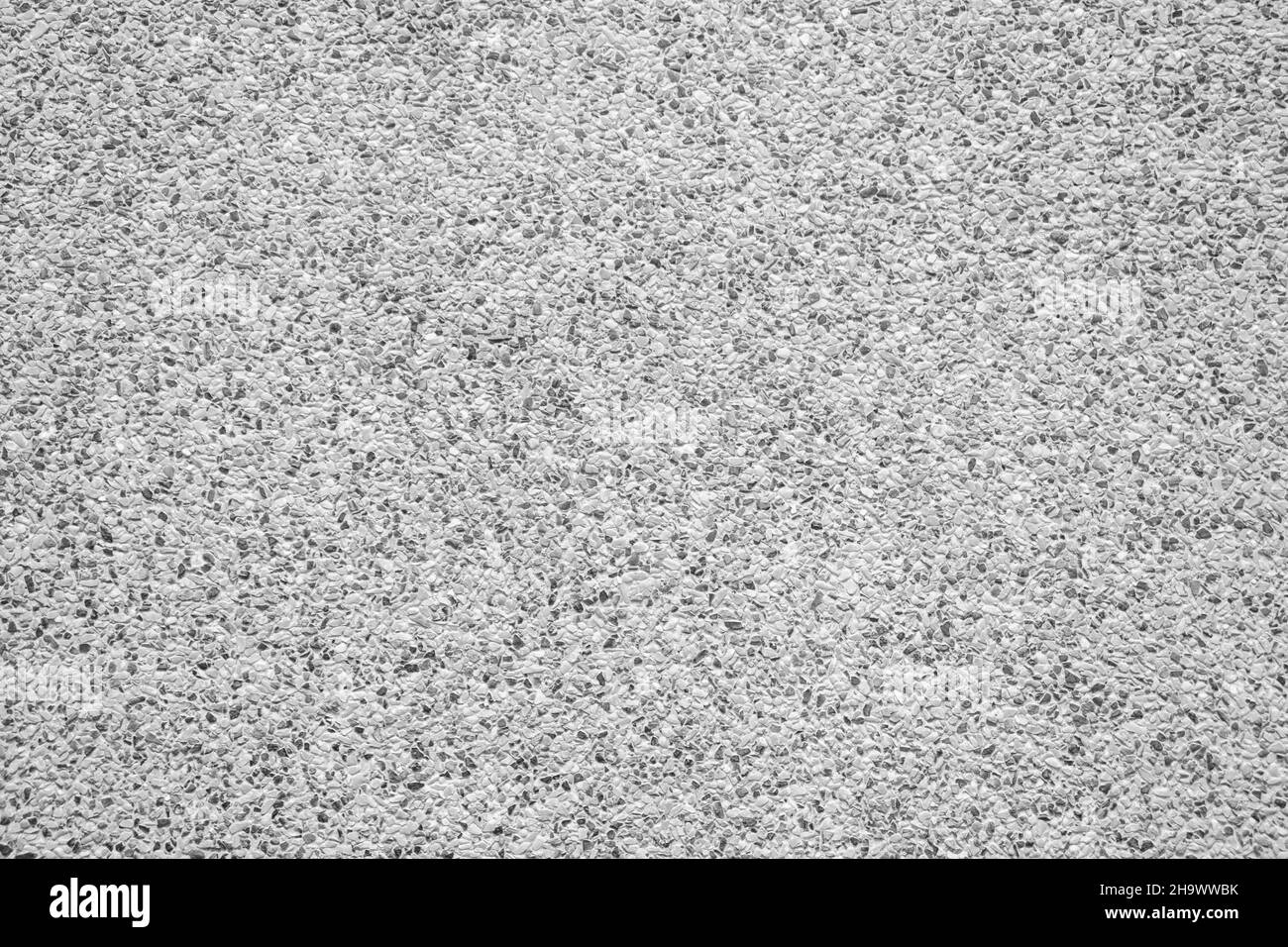 Schwarze und weiße Kieselsteine als Hintergrundstruktur Stockfoto