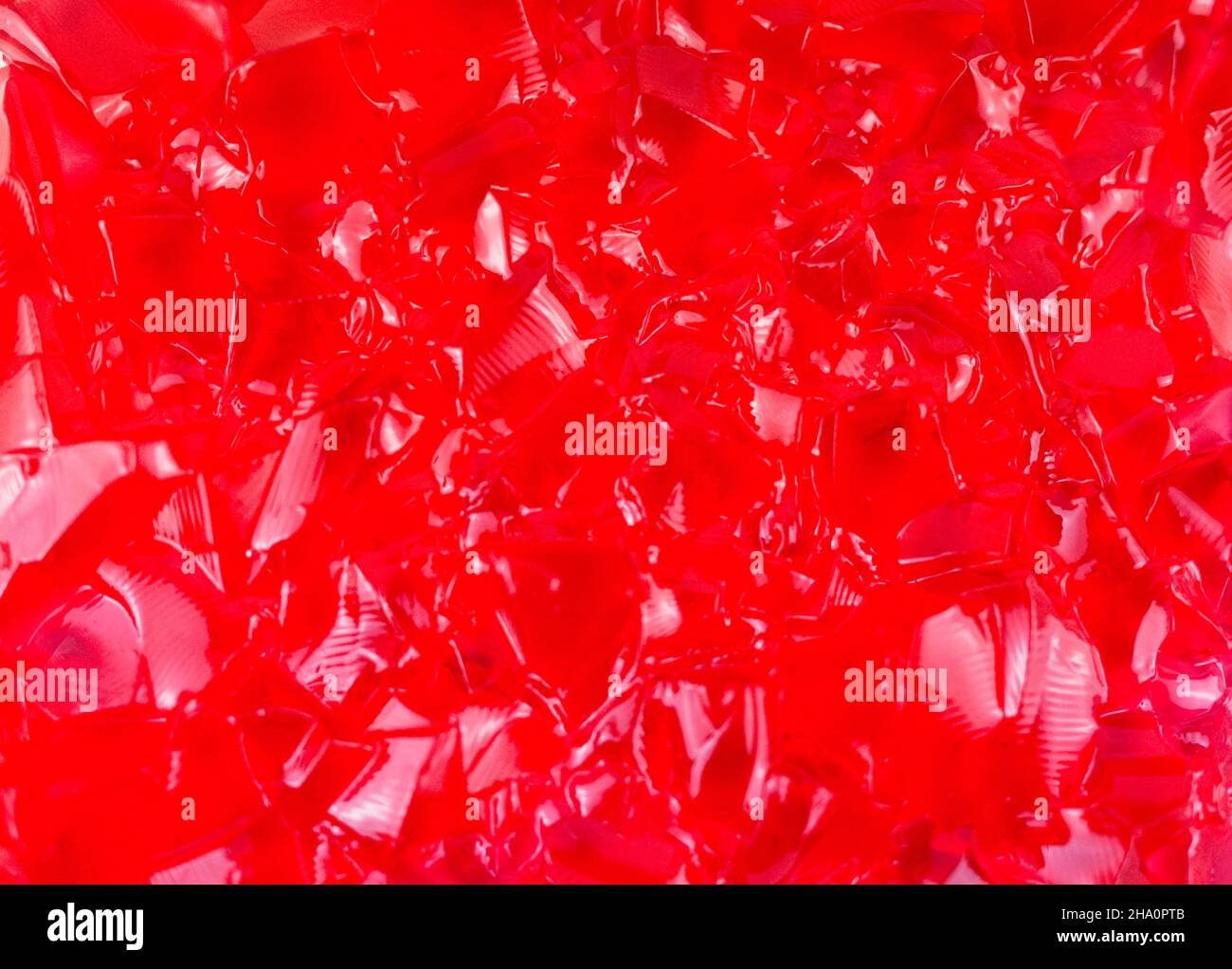 Rote Gelee-Textur mit verschiedenen Formen Stockfoto