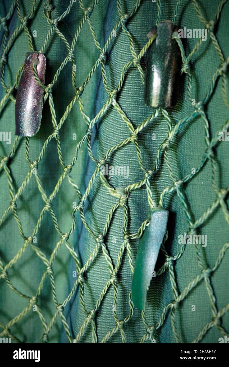 Grünes Kleid und ornamentales Overlay-Material Stockfoto